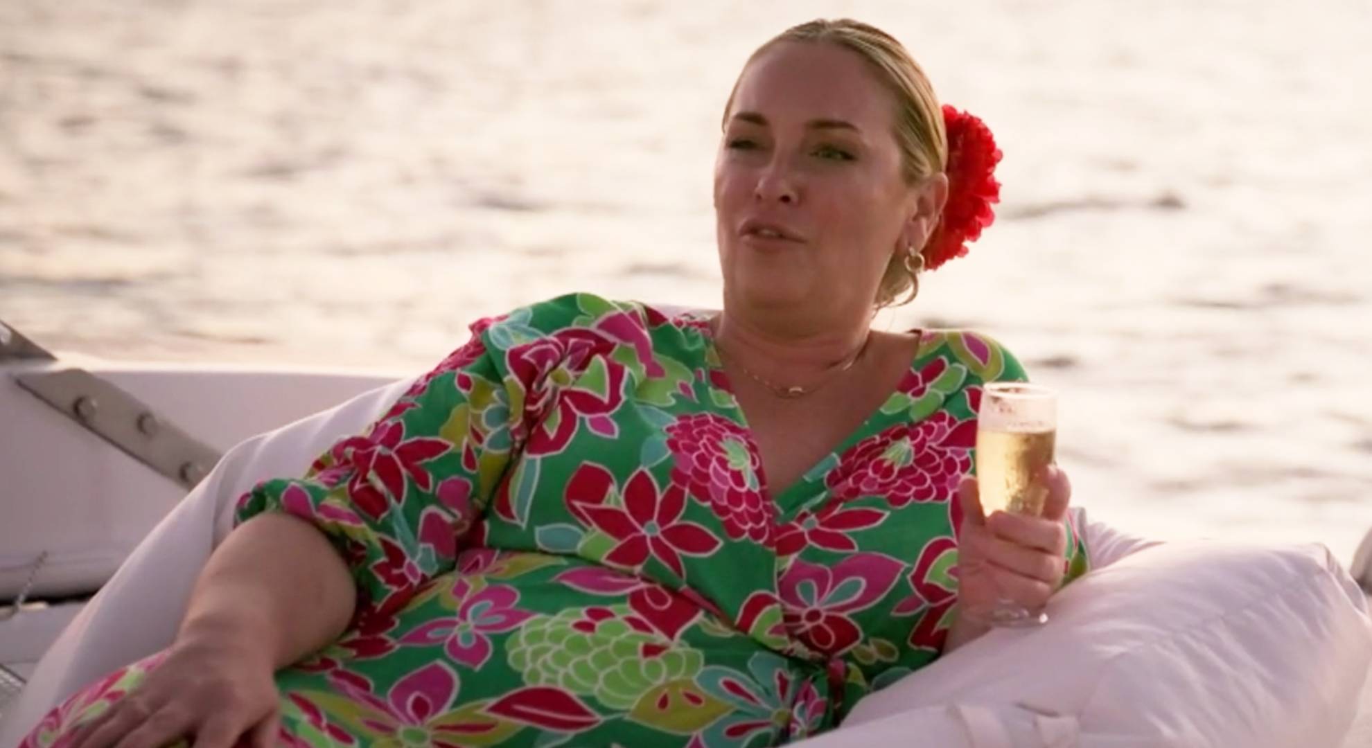 Josie Gibson holds a glass