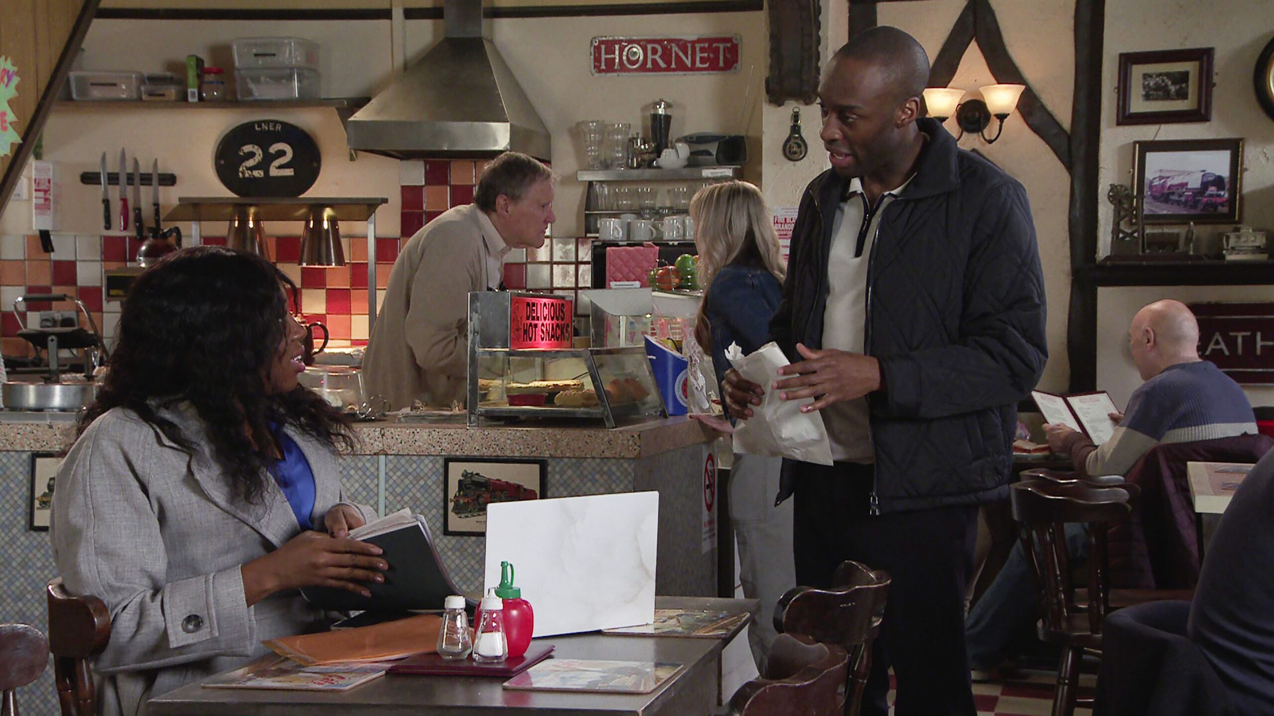 Coronation Street's Dee-Dee and Michael talking at Roy's