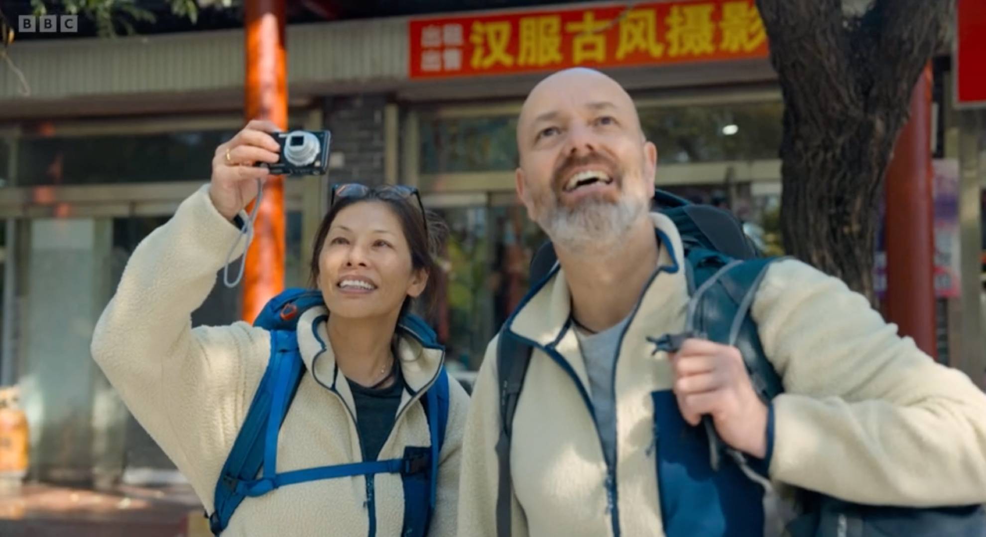 Yin takes a photo, Gaz smiles