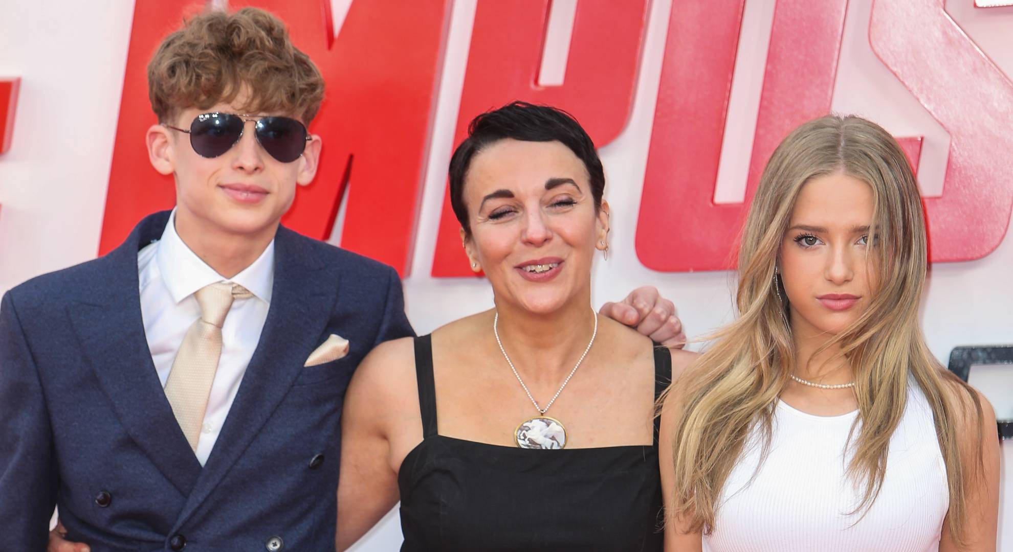 Amanda Abbington poses for pics with her son and daughter