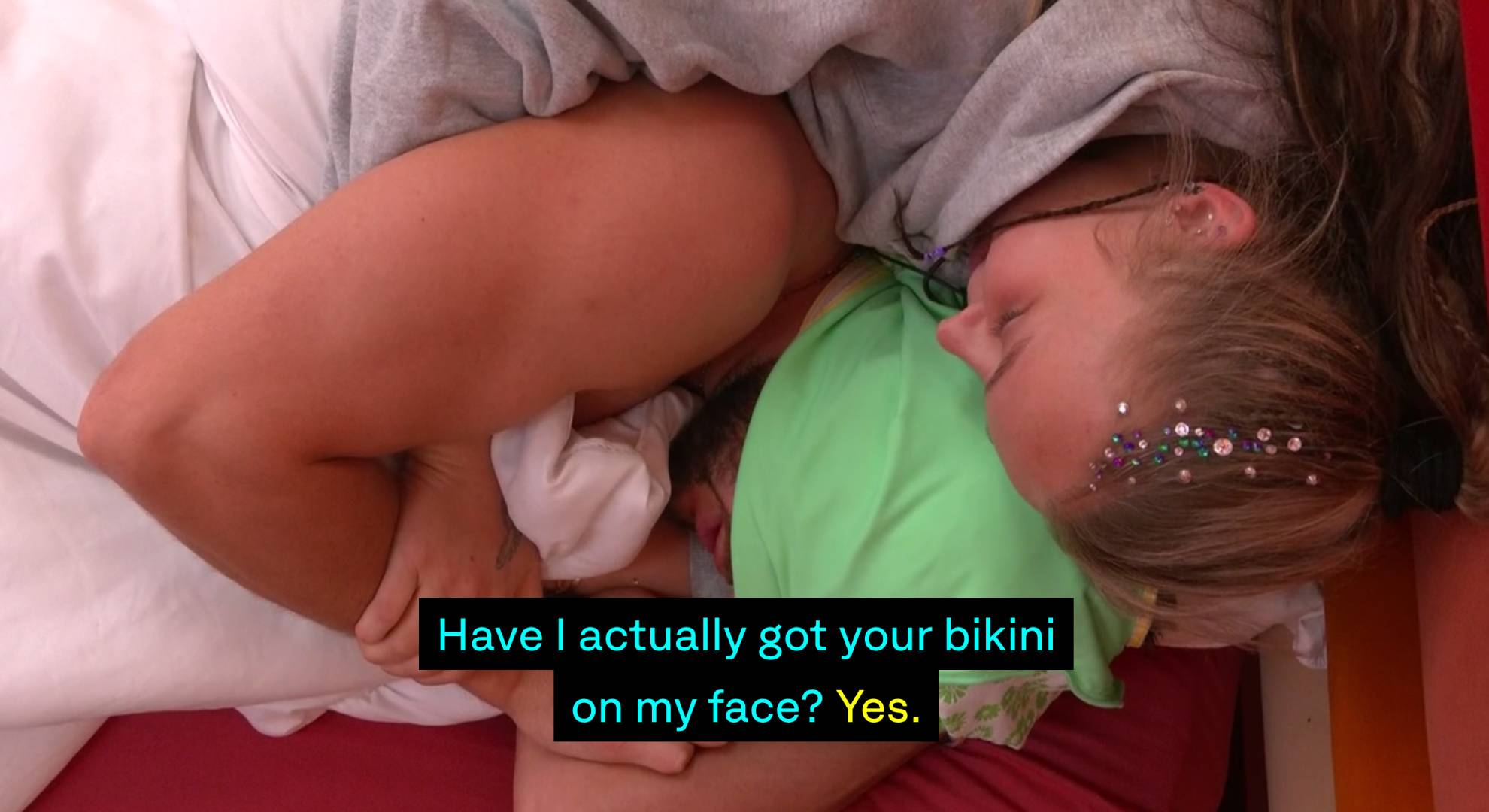 JoJo hugs Chris on the bed