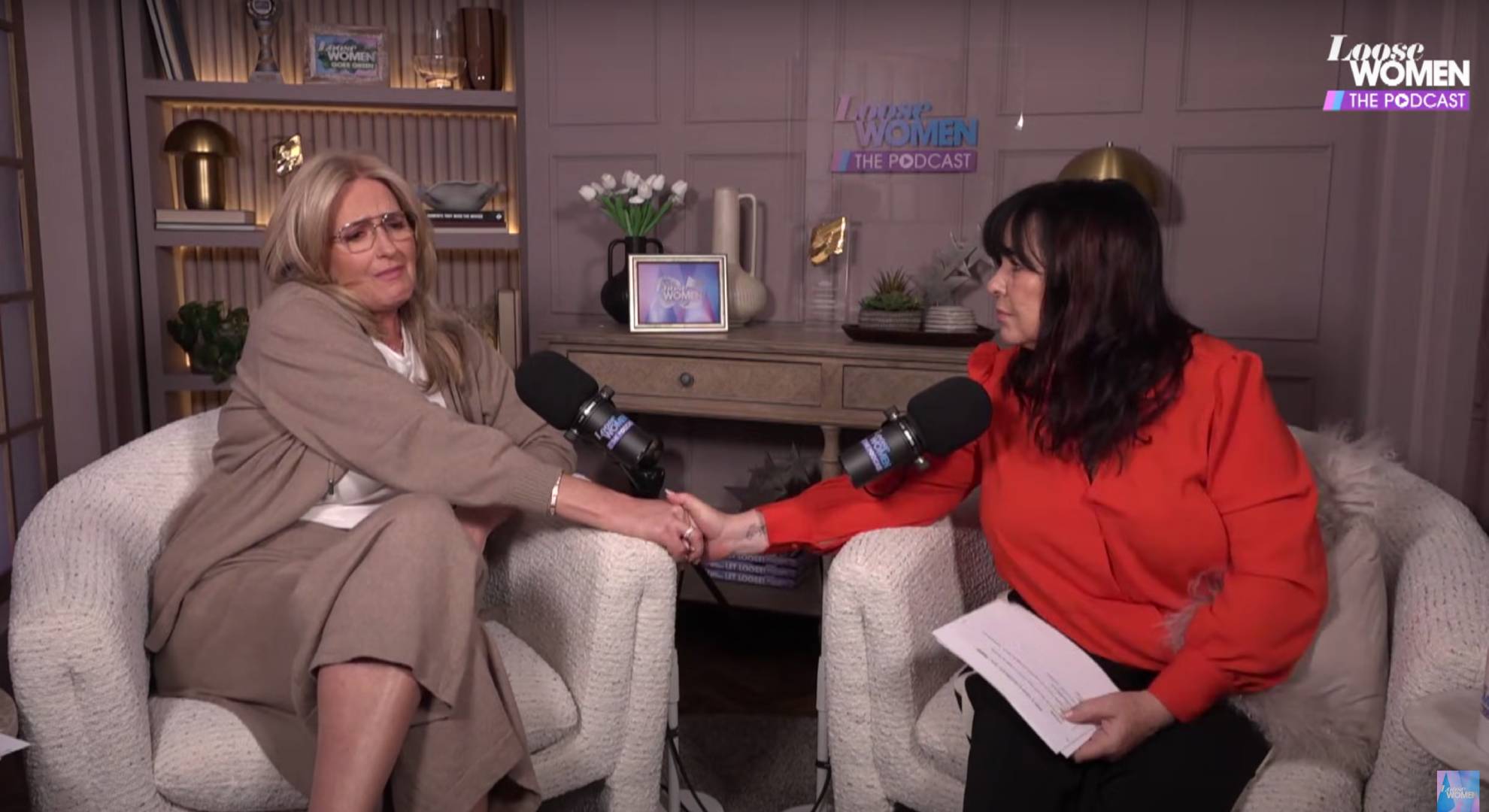 Penny Lancaster holds hands with Coleen Nolan