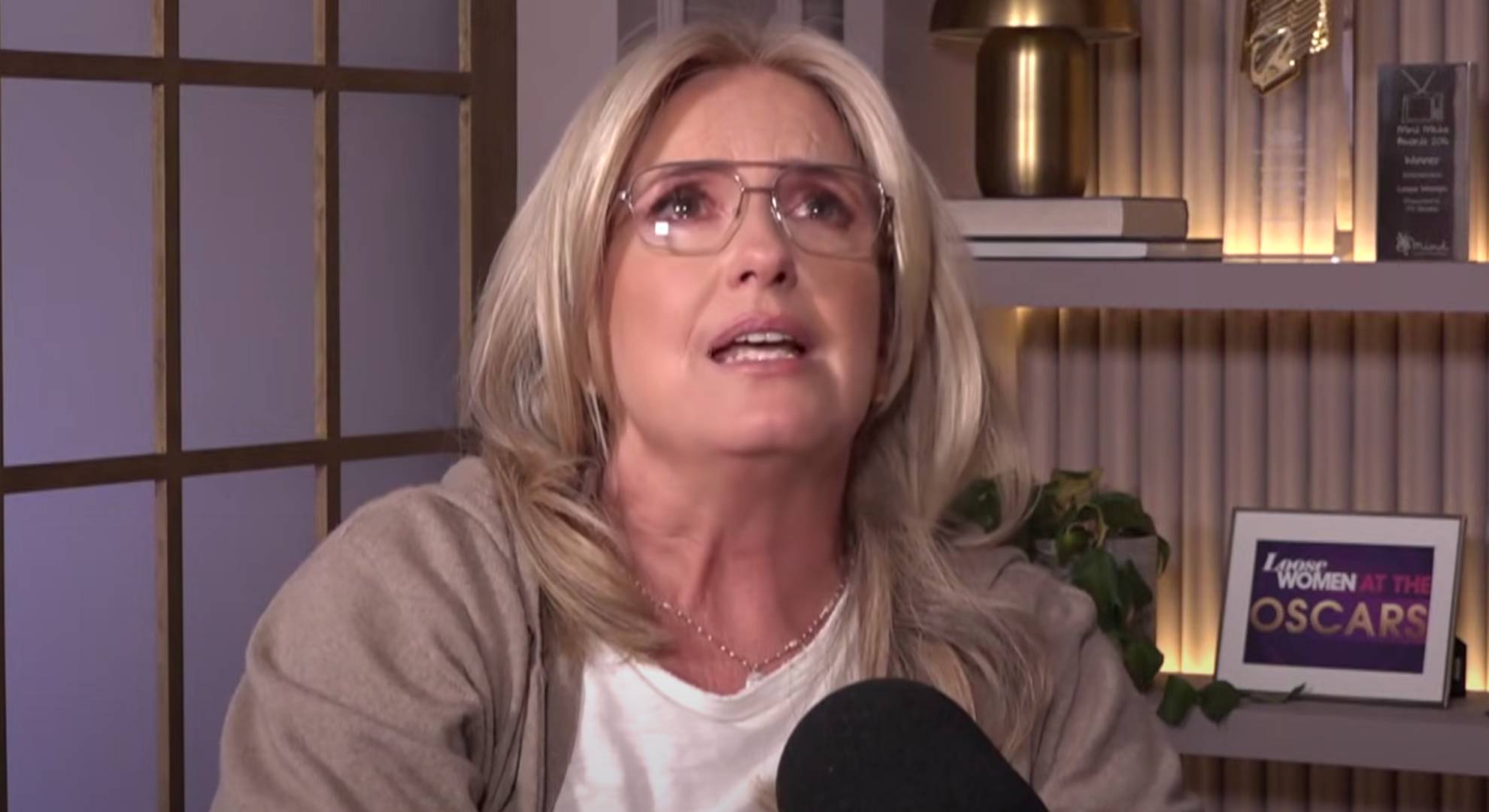 Penny Lancaster looks upwards