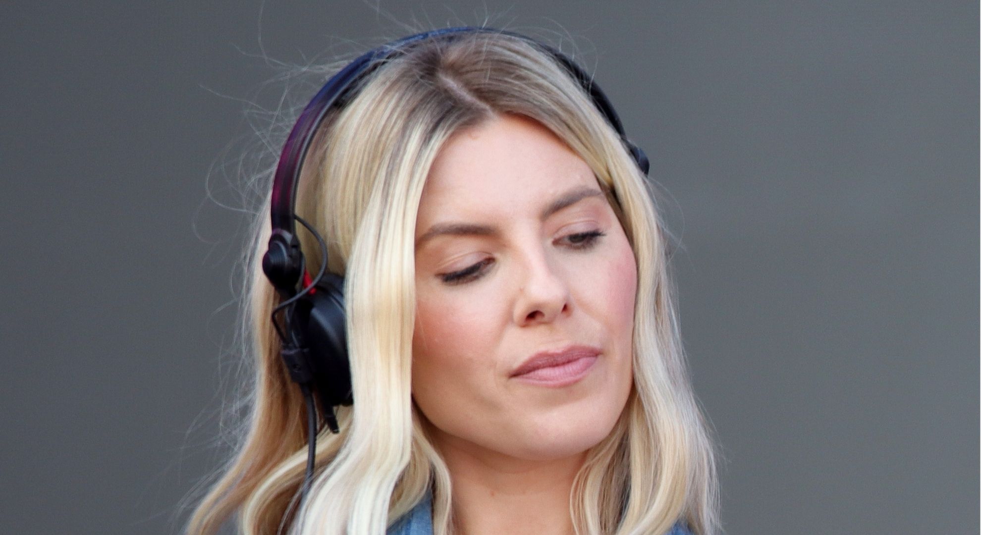 Mollie King looking down