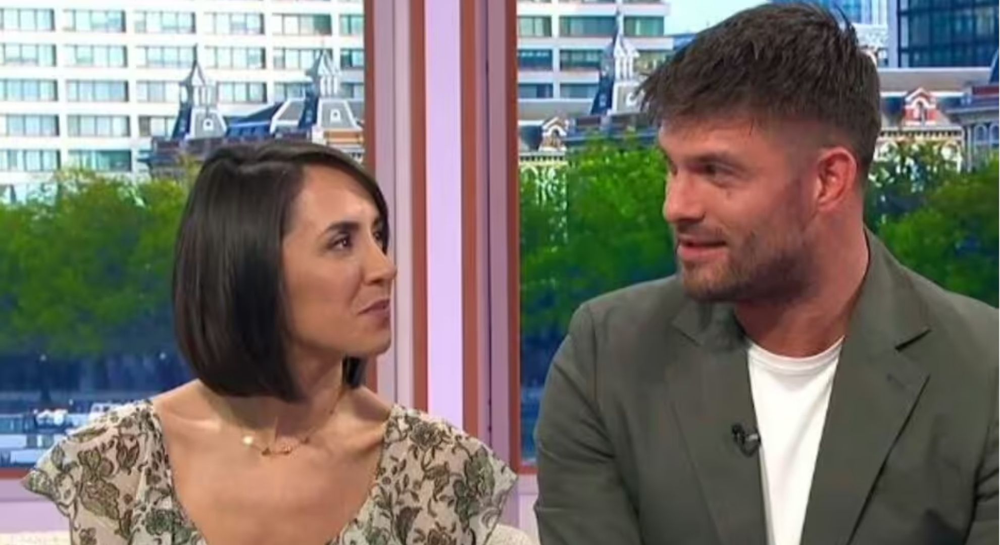 Janette Manrara and Aljaz Skorjanec looking at each other