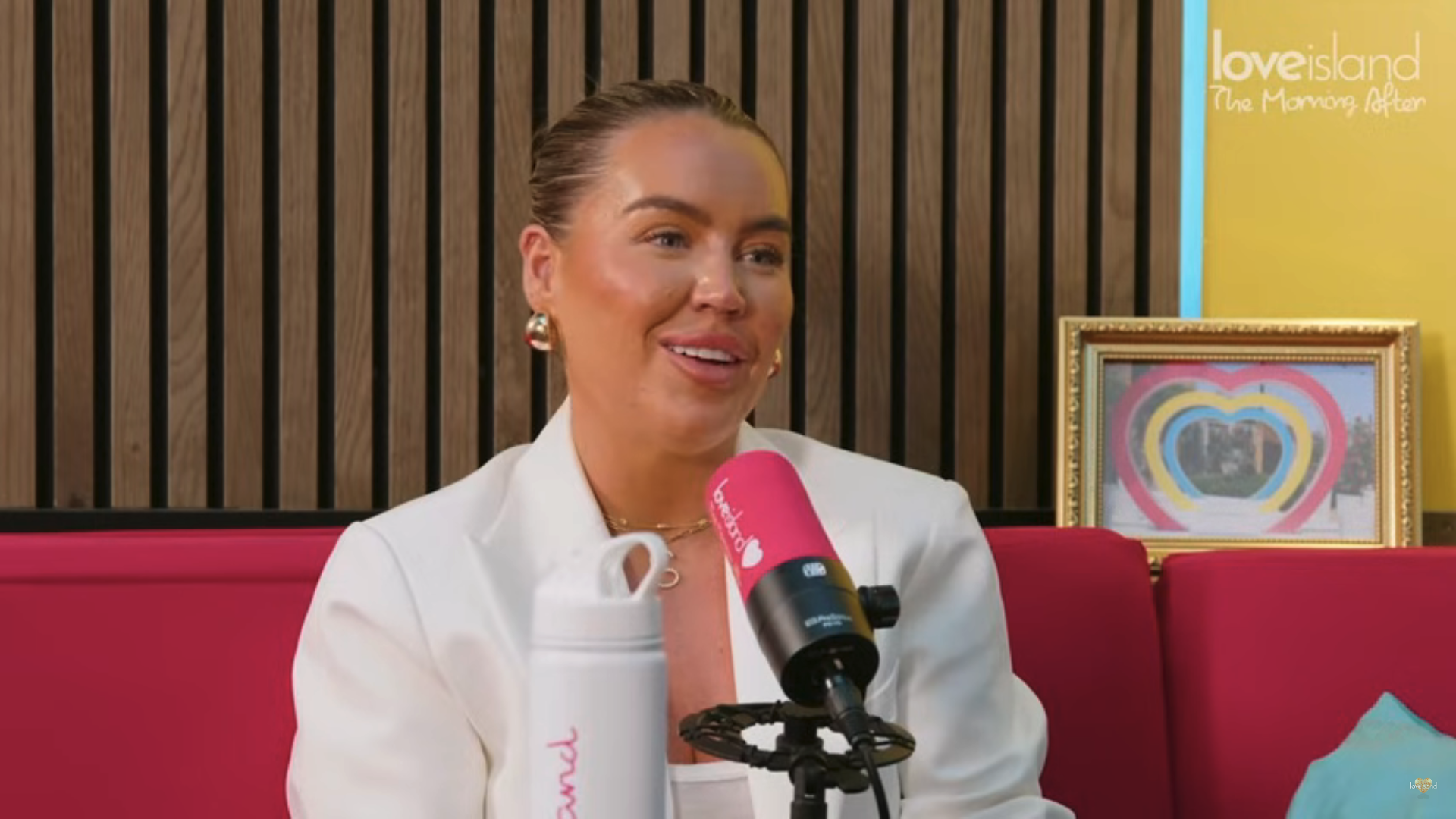 Samantha Kenny speaking on a podcast