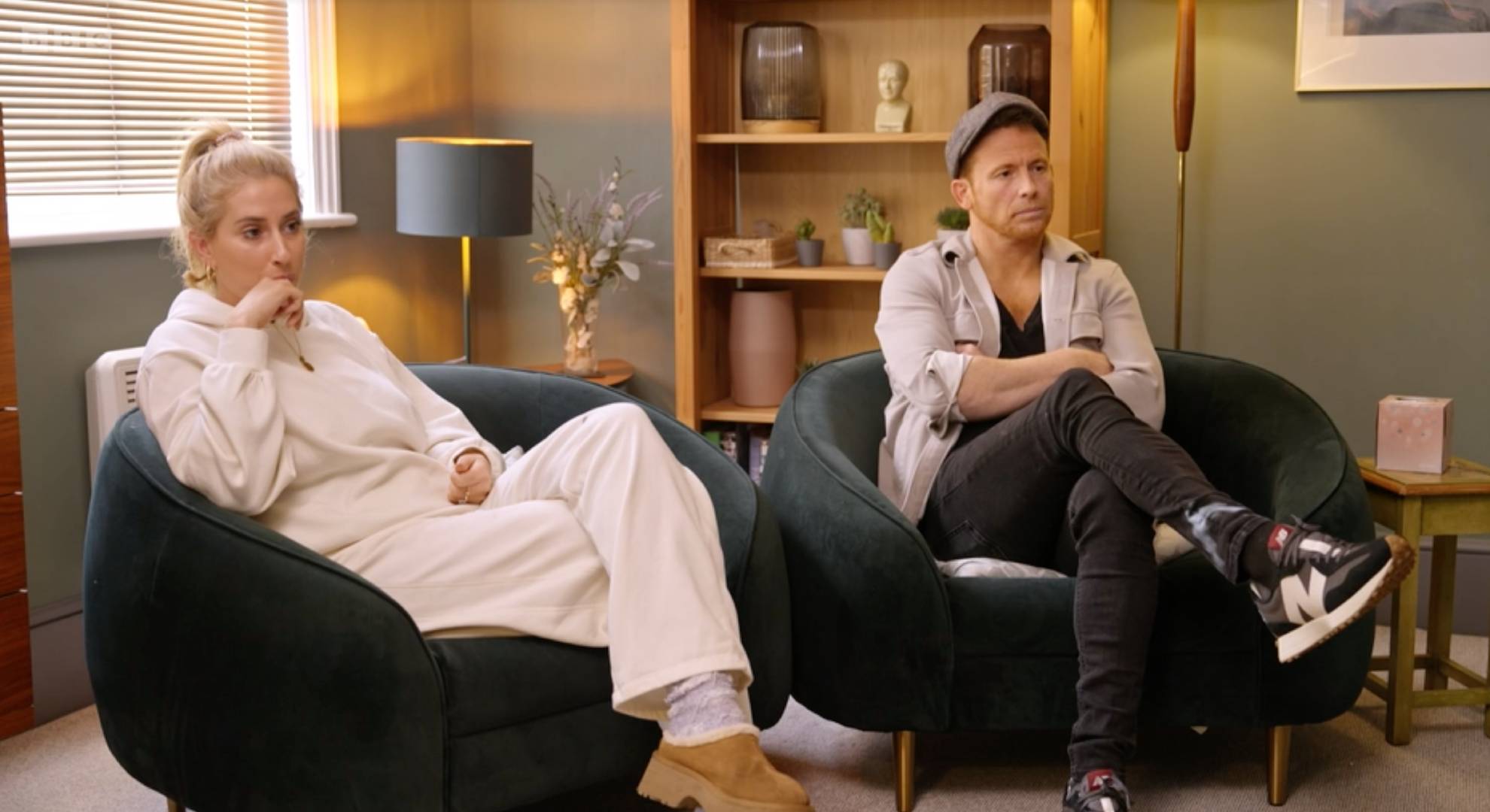 Stacey Solomon and Joe Swash listen