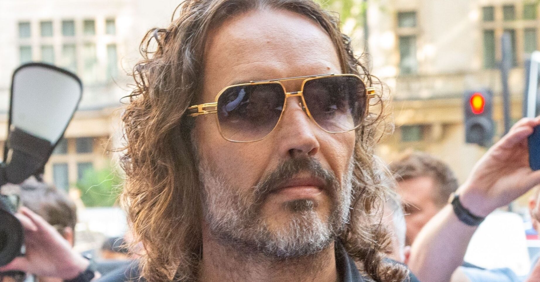 Russell Brand arrives at court