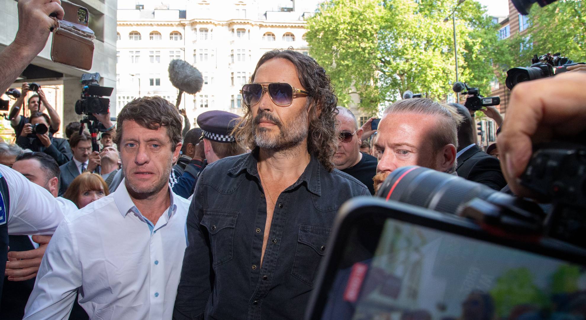 Russell Brand arrives at court