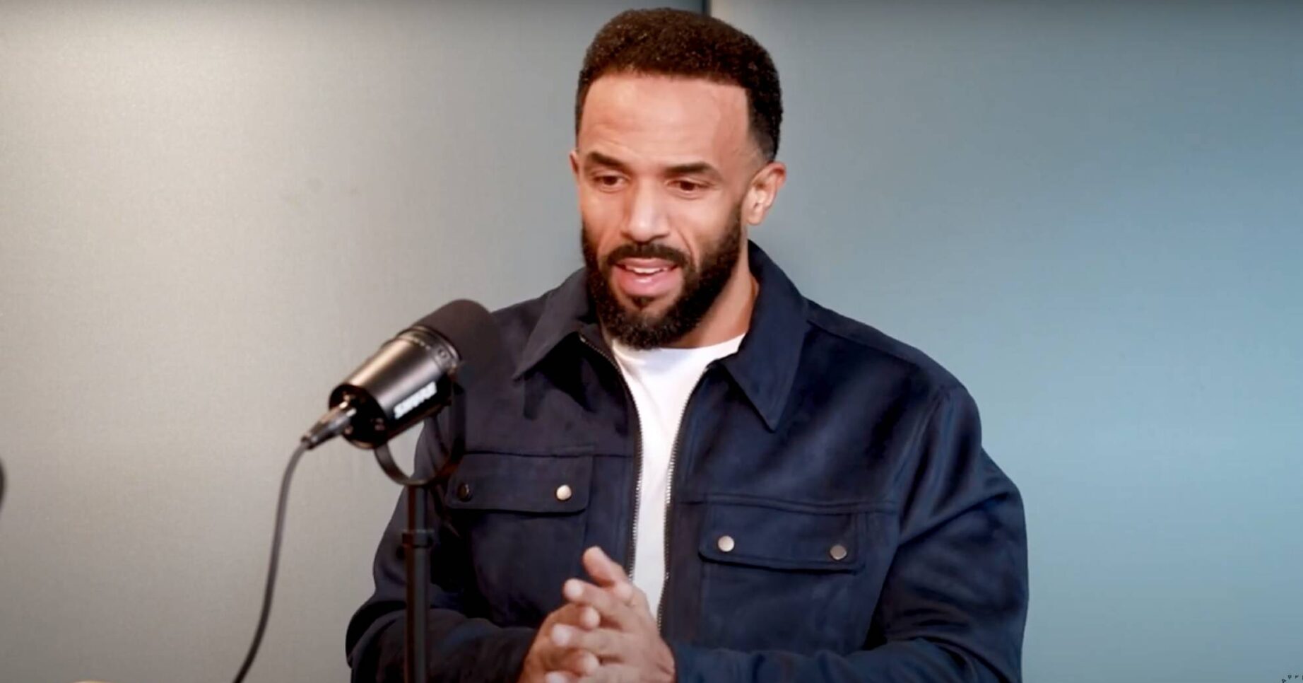 Craig David clasps his hands