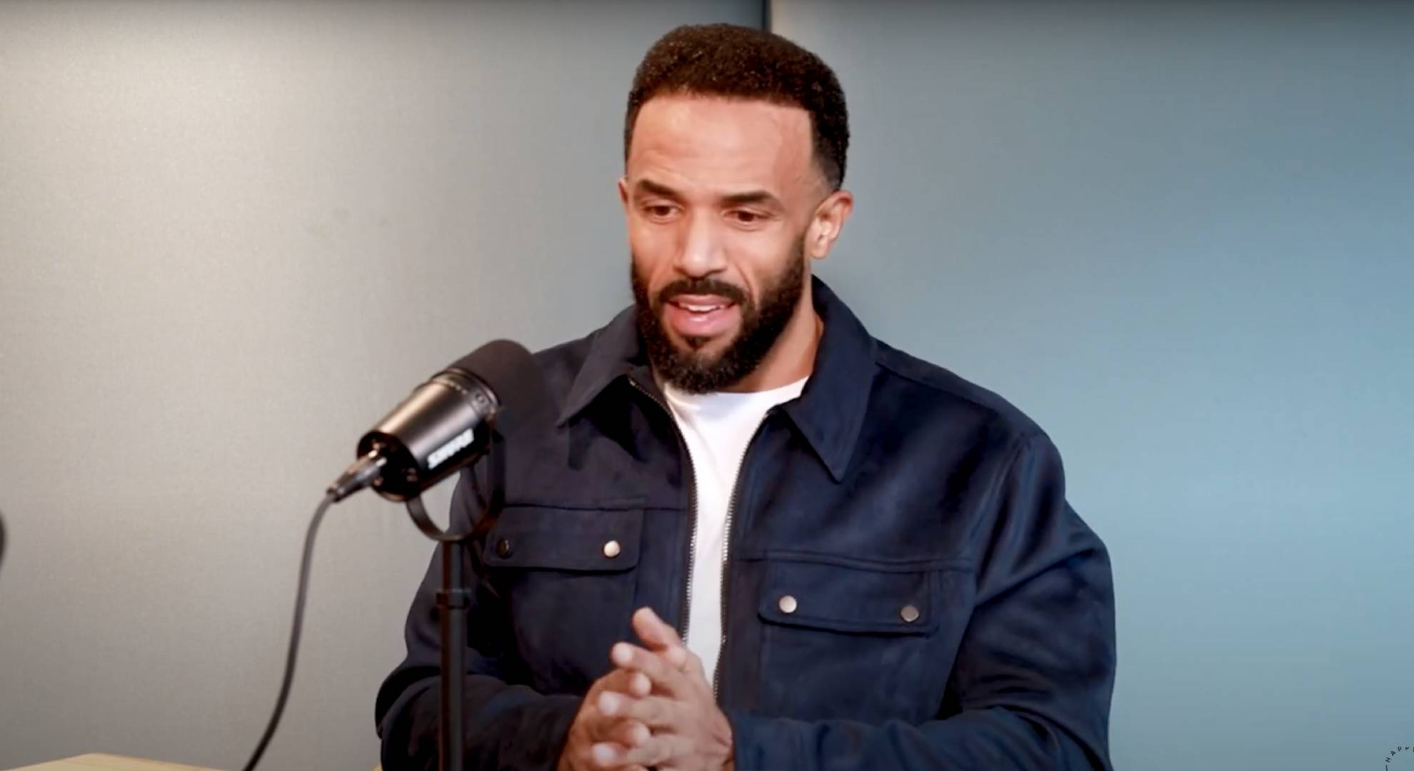 Craig David clasps his hands