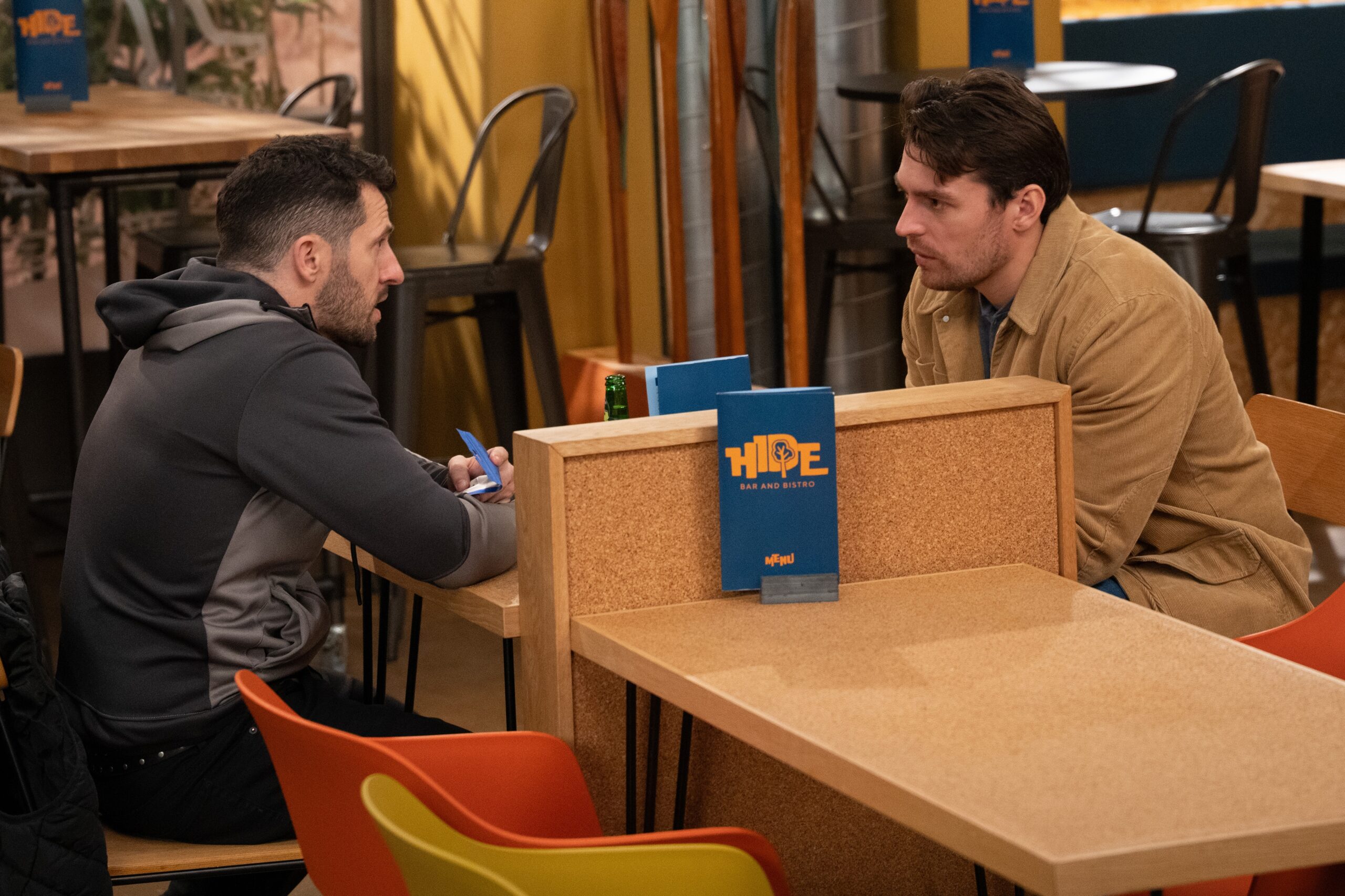 Ross and Mack talking in The Hide