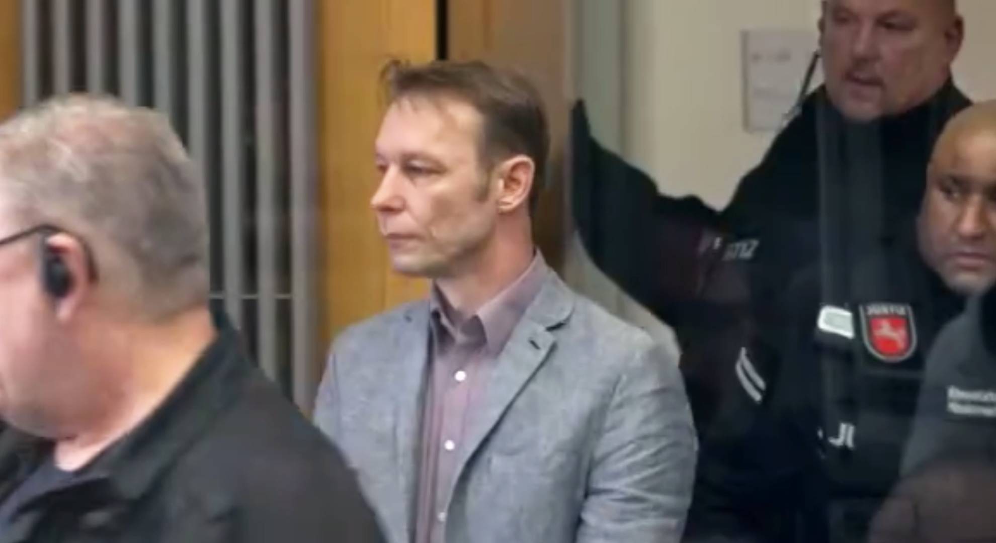 Christian Brueckner walks into court