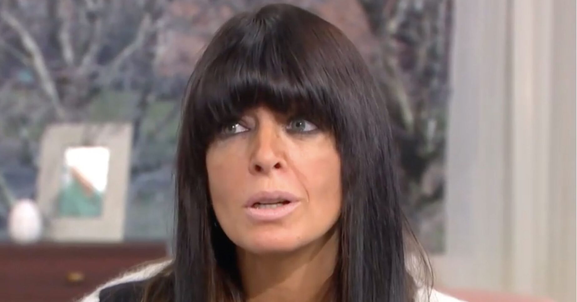 Claudia looking serious