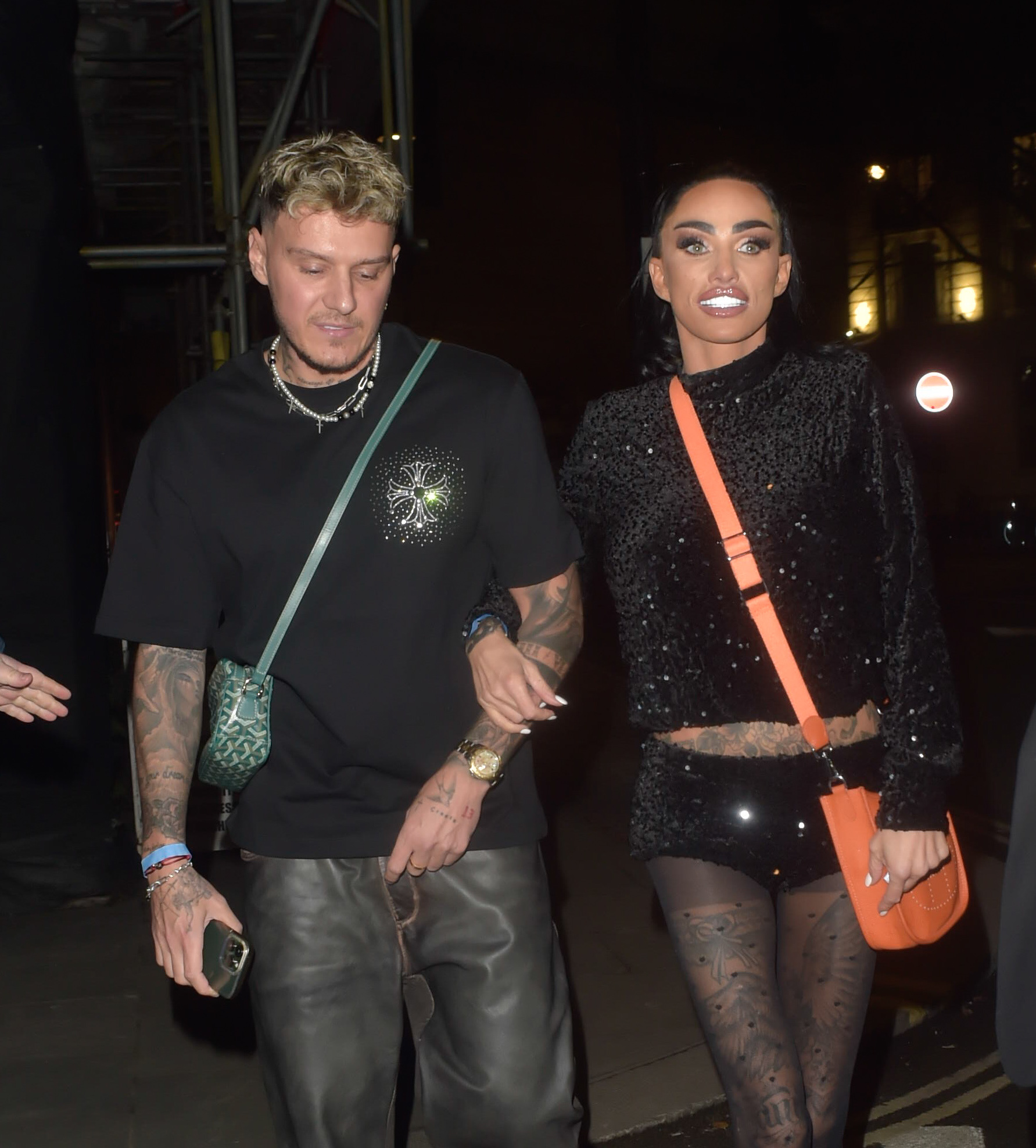 Katie Price and JJ Slater linking arms