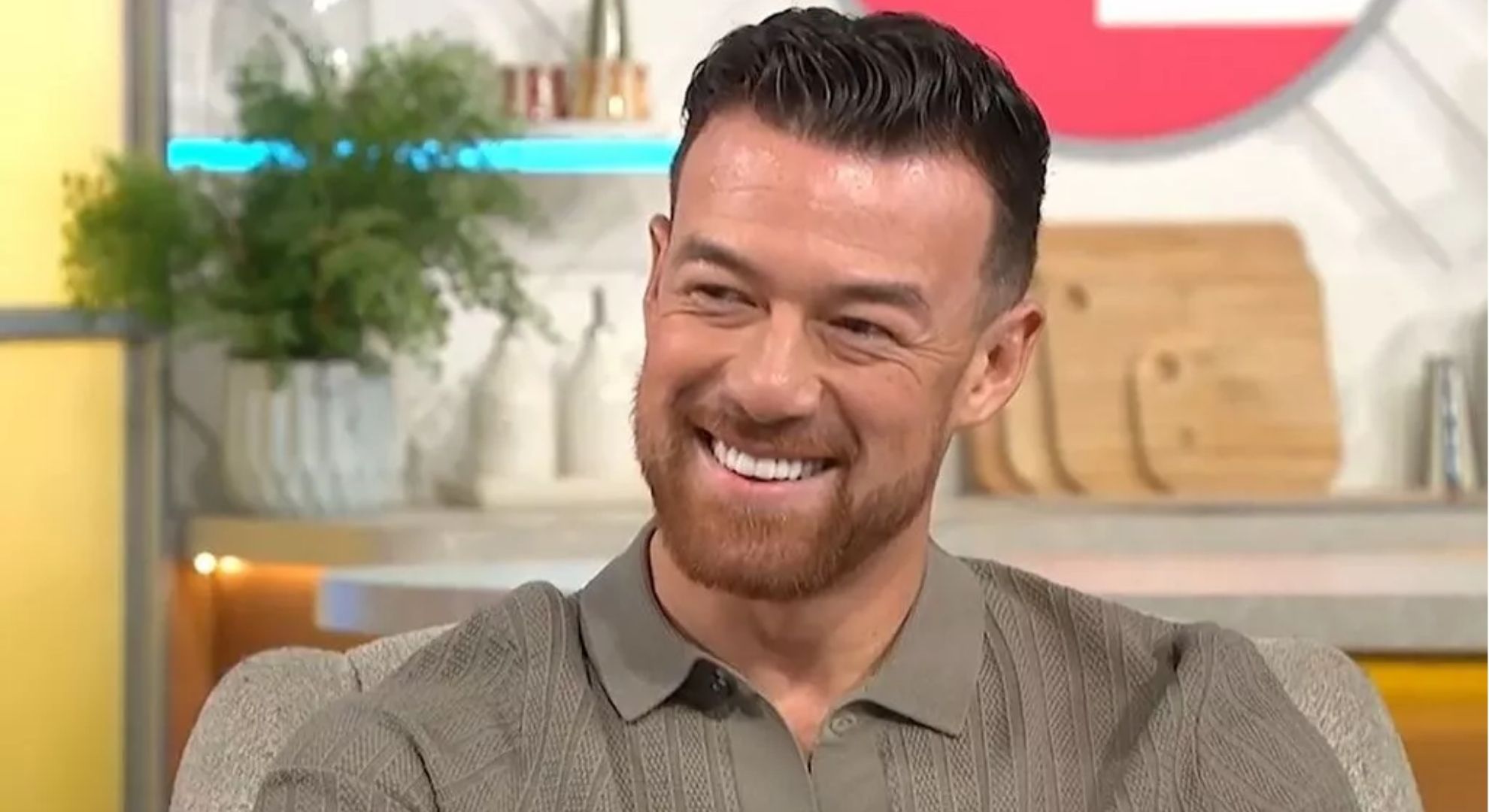 Kai Widdrington smiling