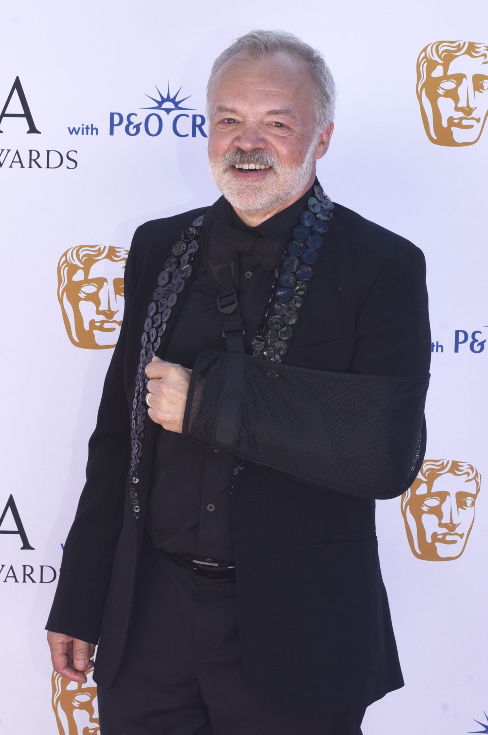 Graham Norton in a sling at the BAFTAs