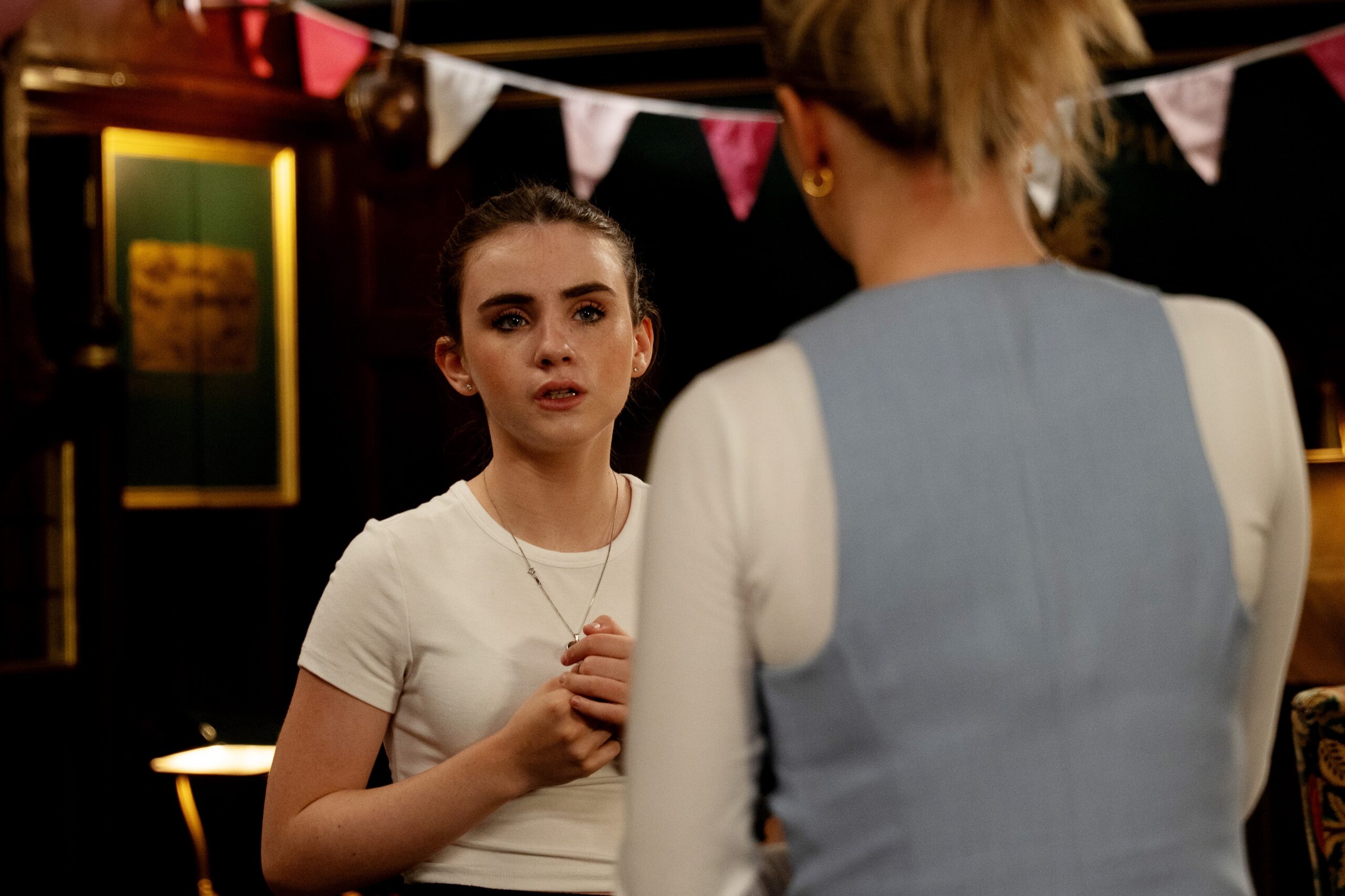 April talking to Belle in the Woolpack