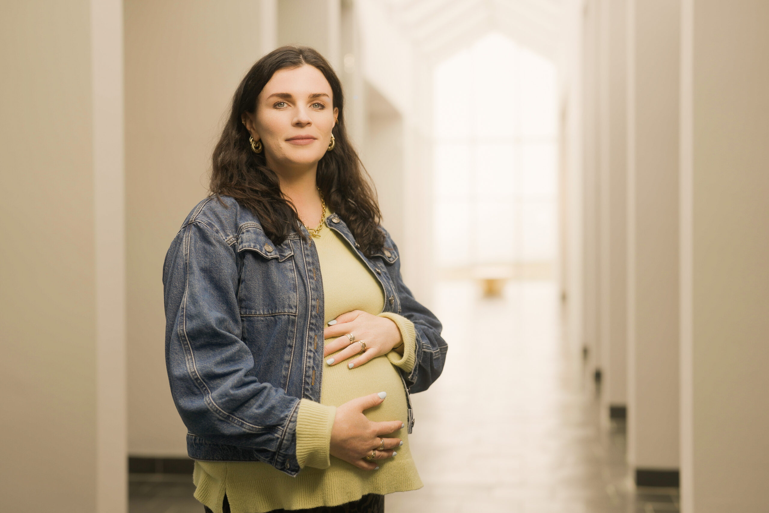 Aisling Bea looking pregnant and smiling