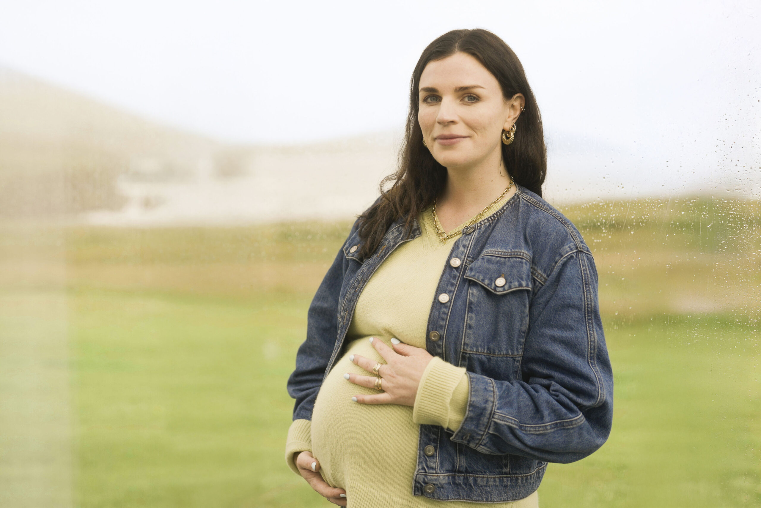 Aisling Bea looking pregnant and smiling