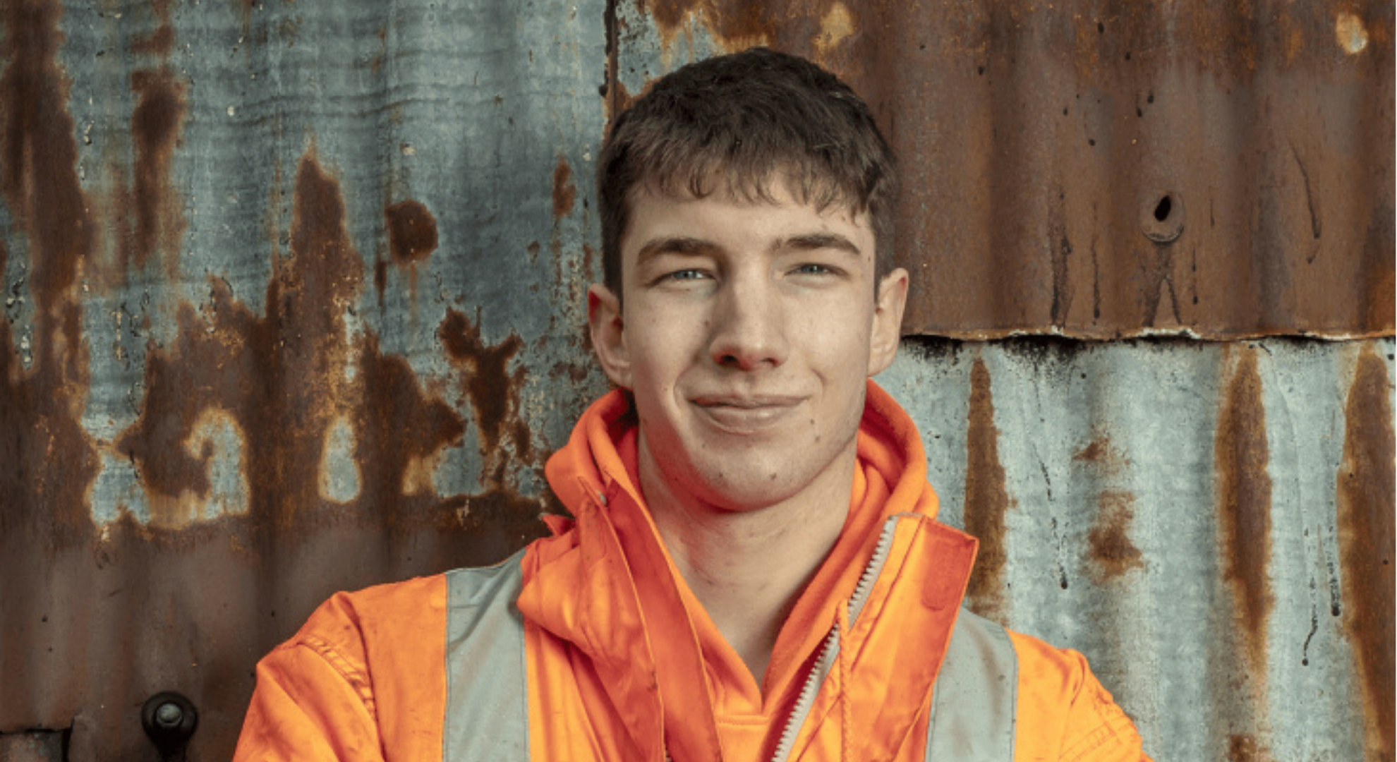 Reuben Owen smiling in his high-vis
