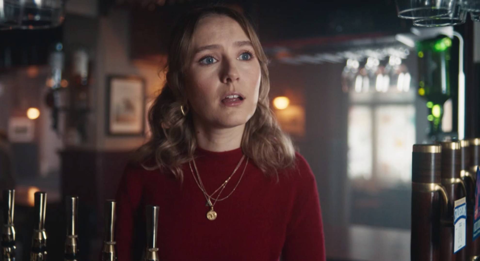 Alison reacts with surprise