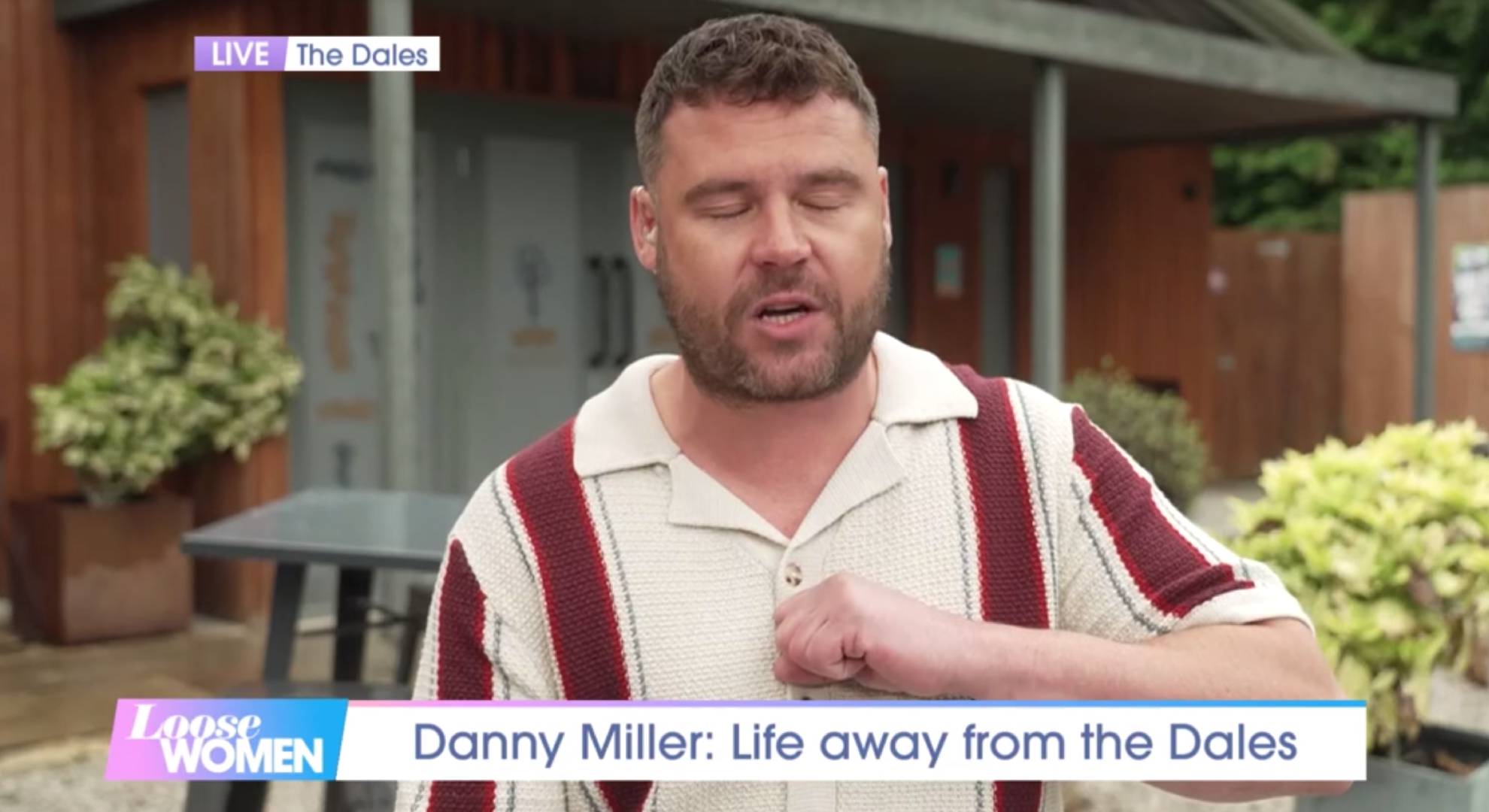 Danny Miller pats his chest on Loose Women today