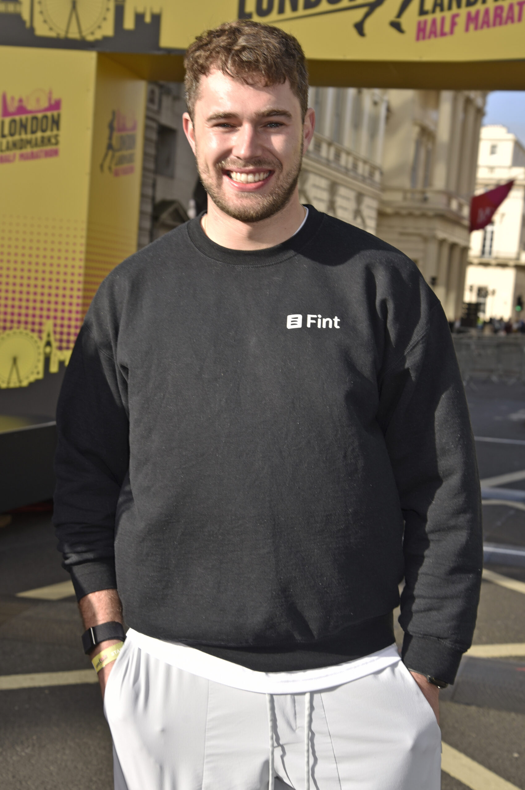 Curtis Pritchard smiling in a black top