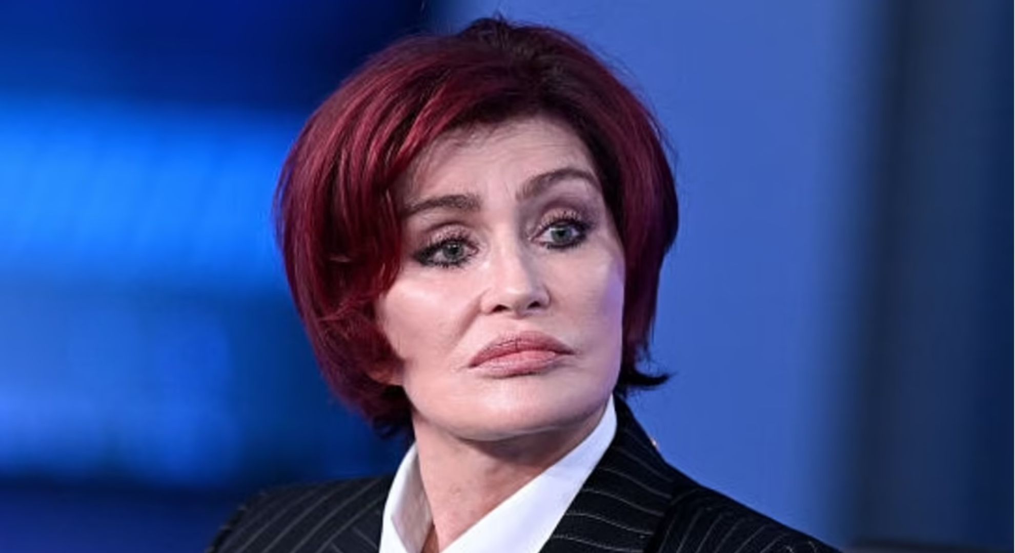 Sharon Osbourne looking in front
