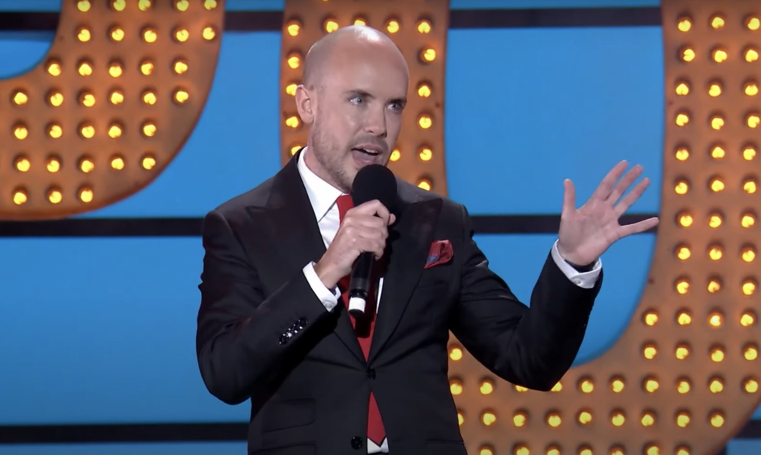 Tom Allen on stage at the Apollo