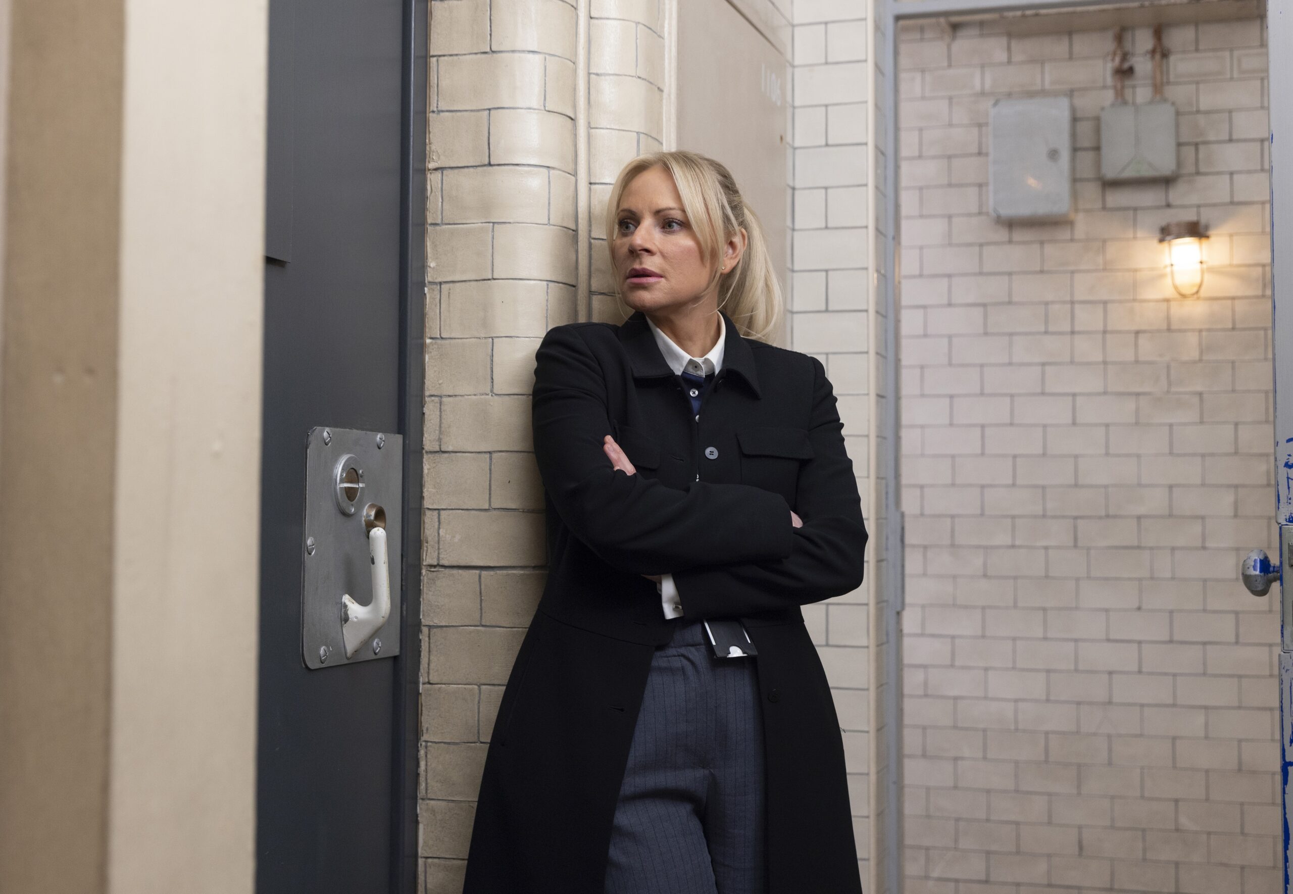 Lisa Swain at the station with arms folded