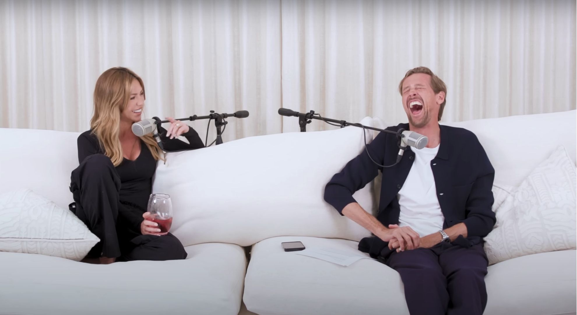 Abbey Clancy and Peter Crouch laughing