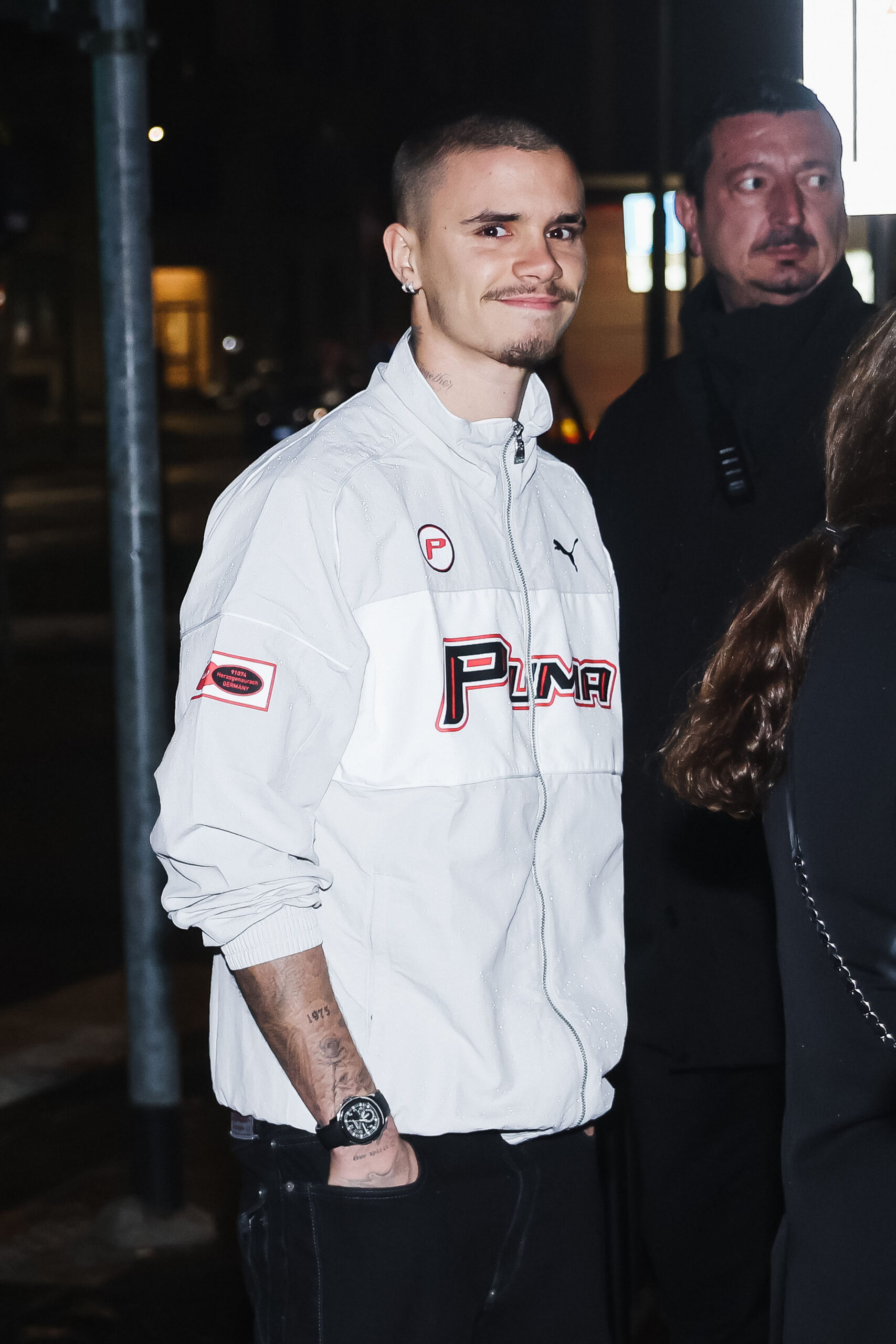 Romeo Beckham smiling