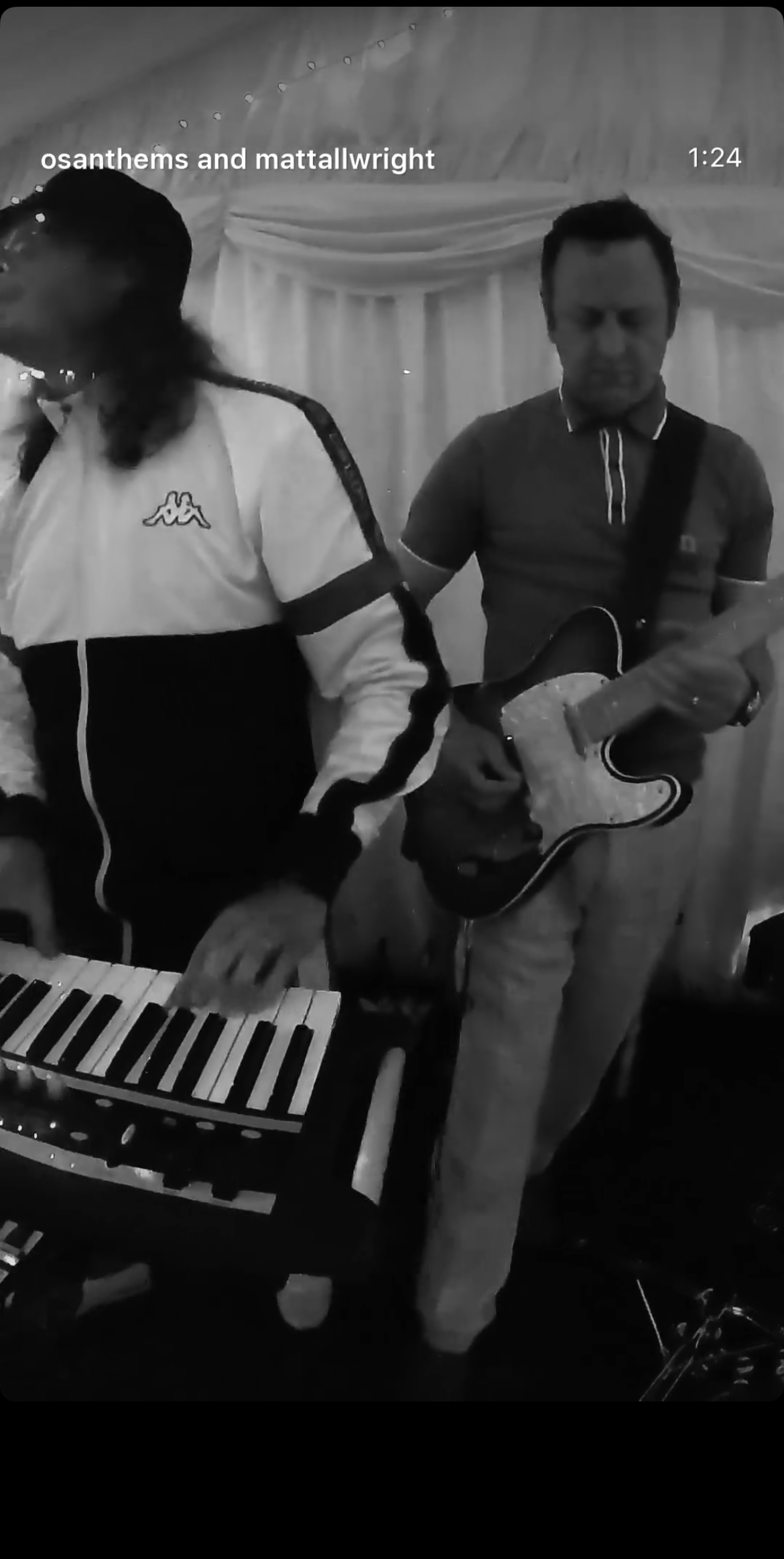 Matt Allwright playing guitar at Nikki Fox's wedding 