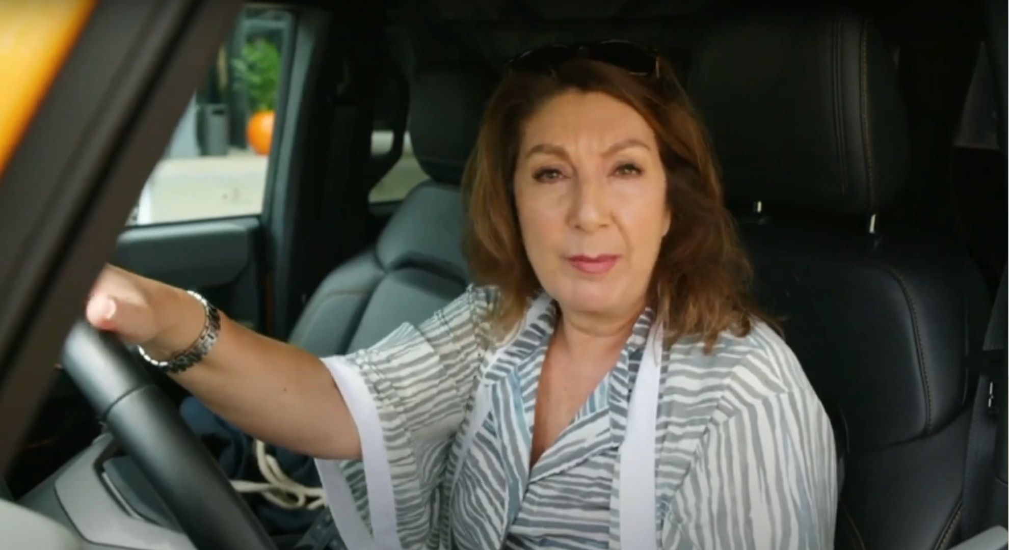 Jane McDonald in a car 