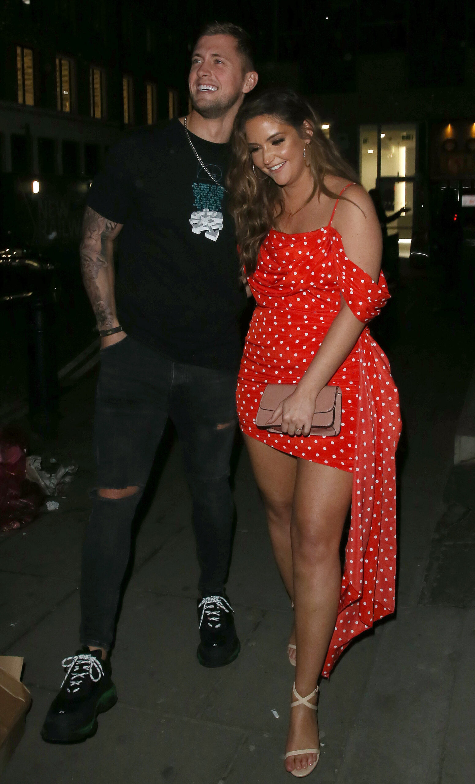 Dan Osborne and Jacqueline Jossa smiling on a night out