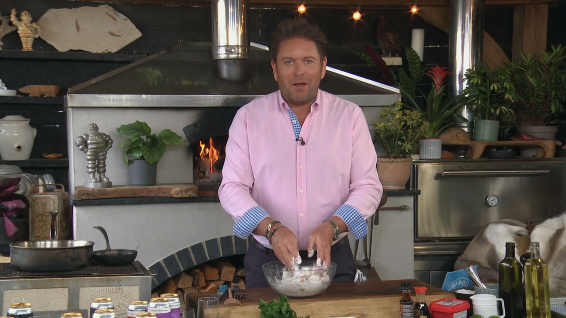James Martin cooking in a pink shirt