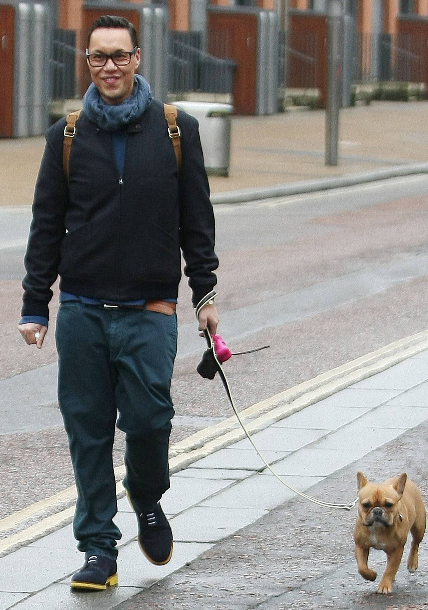 Gok Wan walking a dog