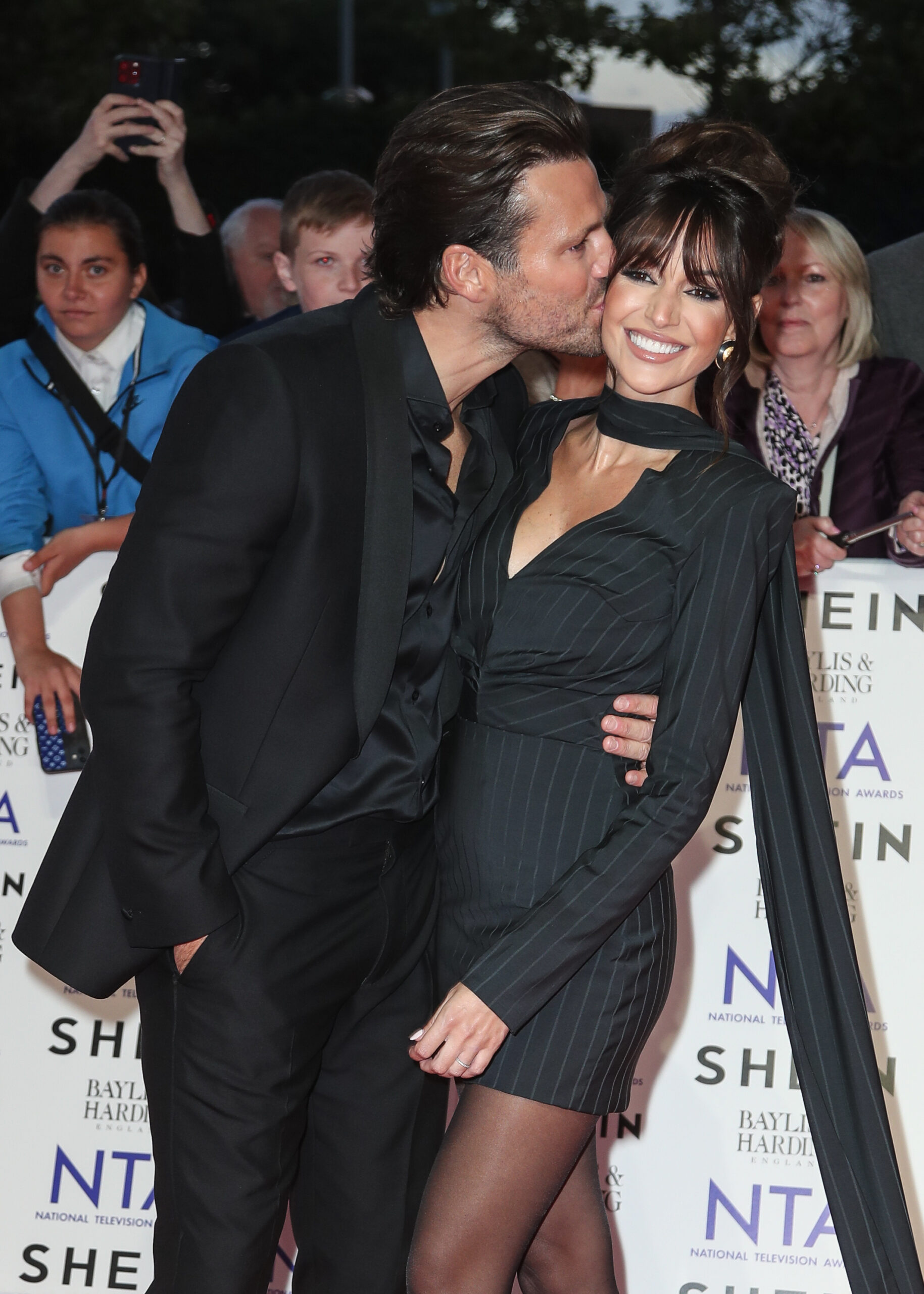 Mark Wright kissing Michelle Keegan
