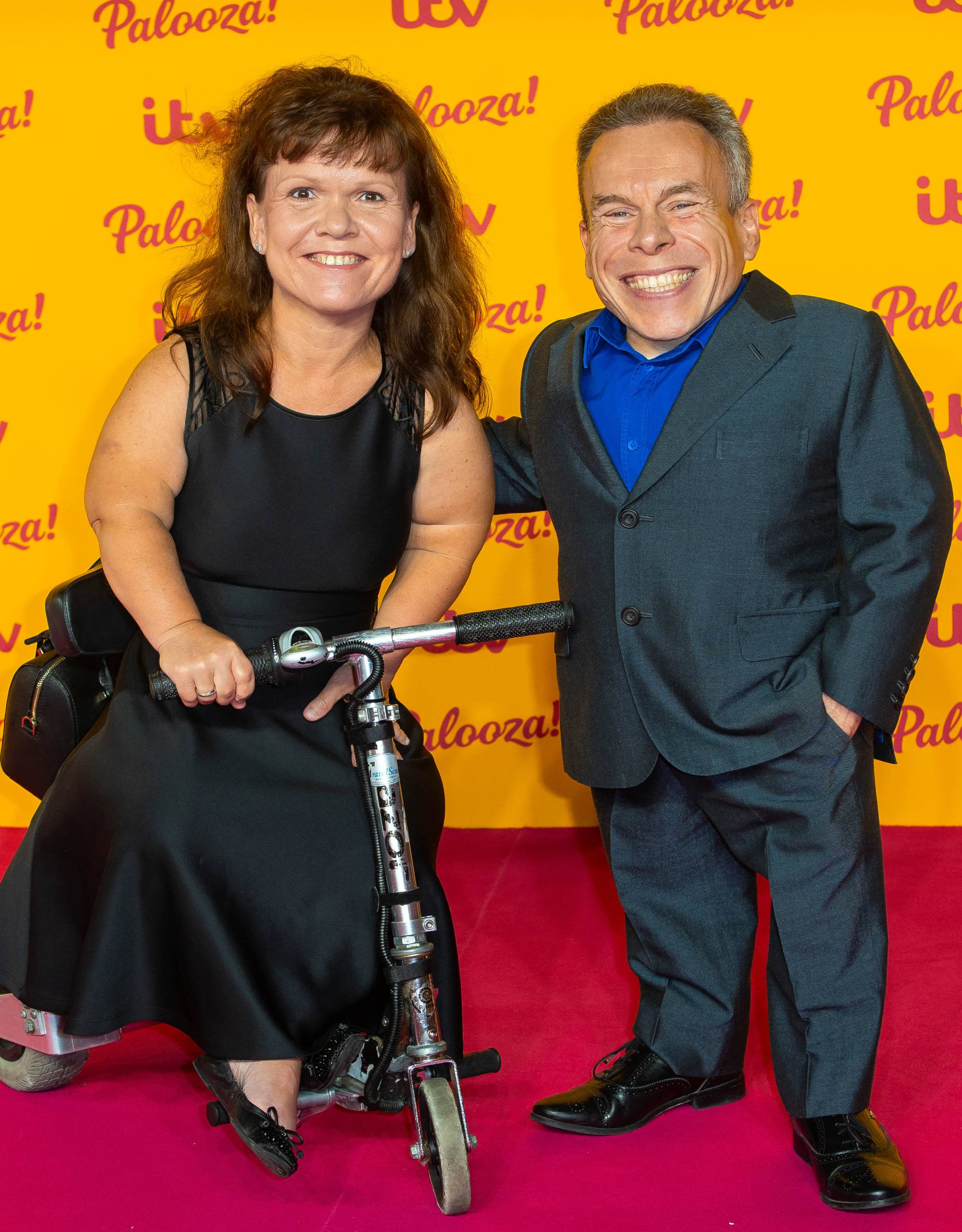 on February 7 following a sudden loss of mobility in her lower limbs after a disc prolapse. She then underwent a thoracotomy operation – where the chest wall is opened – on February 20.Her condition improved and, on March 14, the hospital was planning to discharge her. Warwick Davis standing with wife Samantha