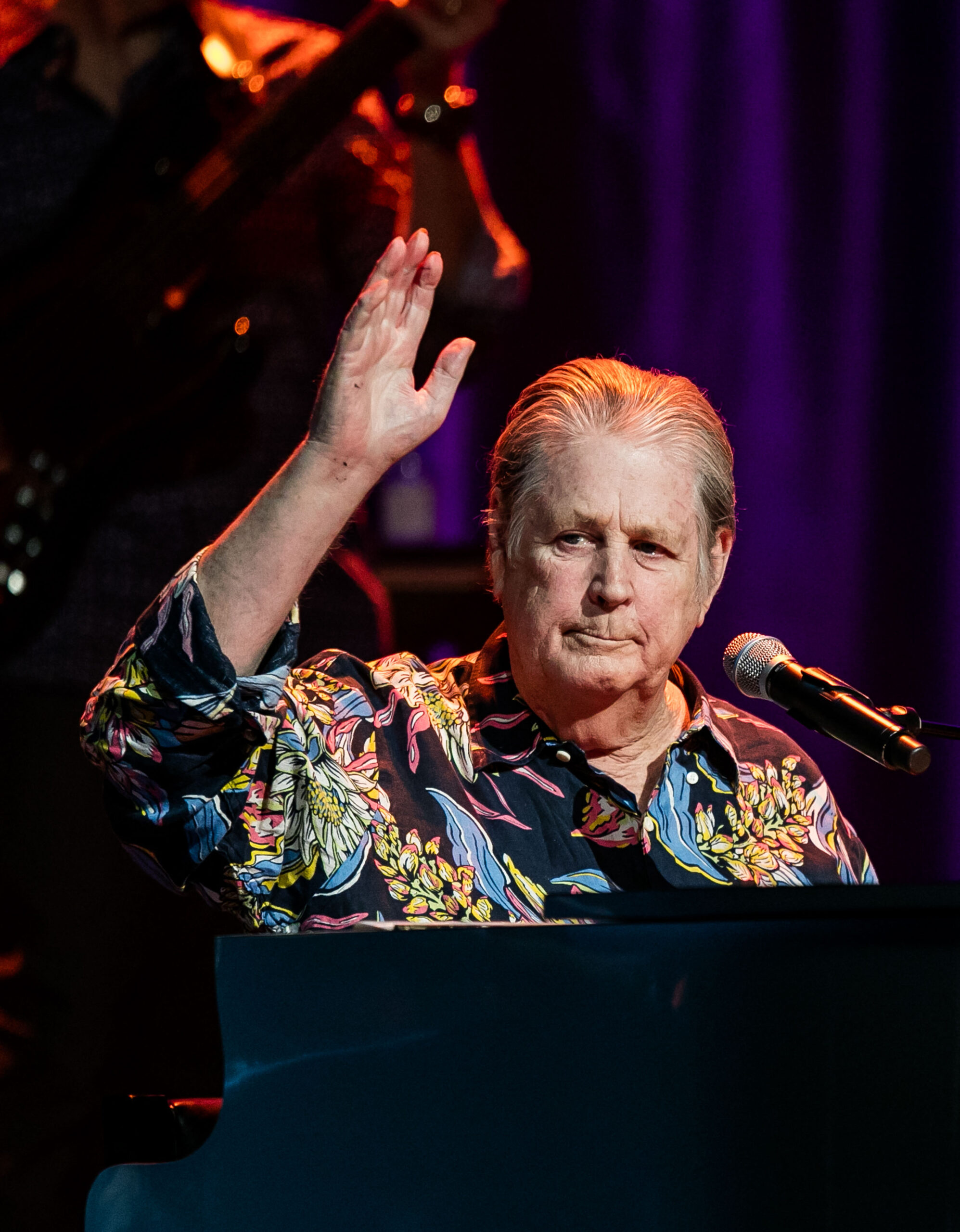 Brian Wilson on stage performing