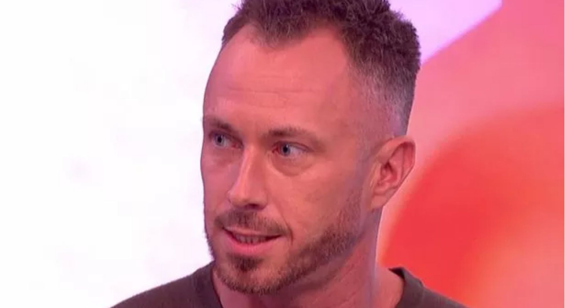 James Jordan looking to the side