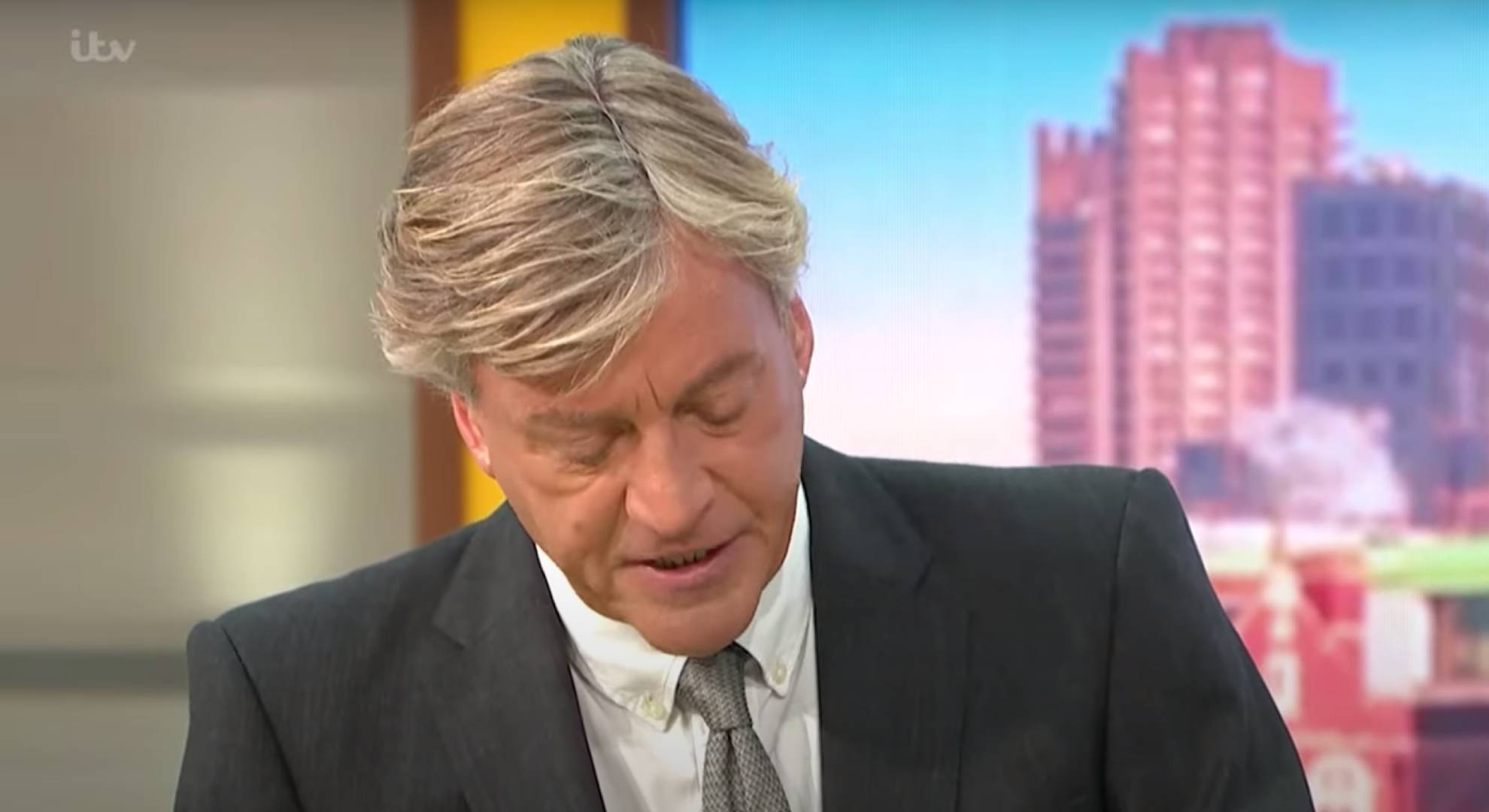 Richard Madeley looks downwards