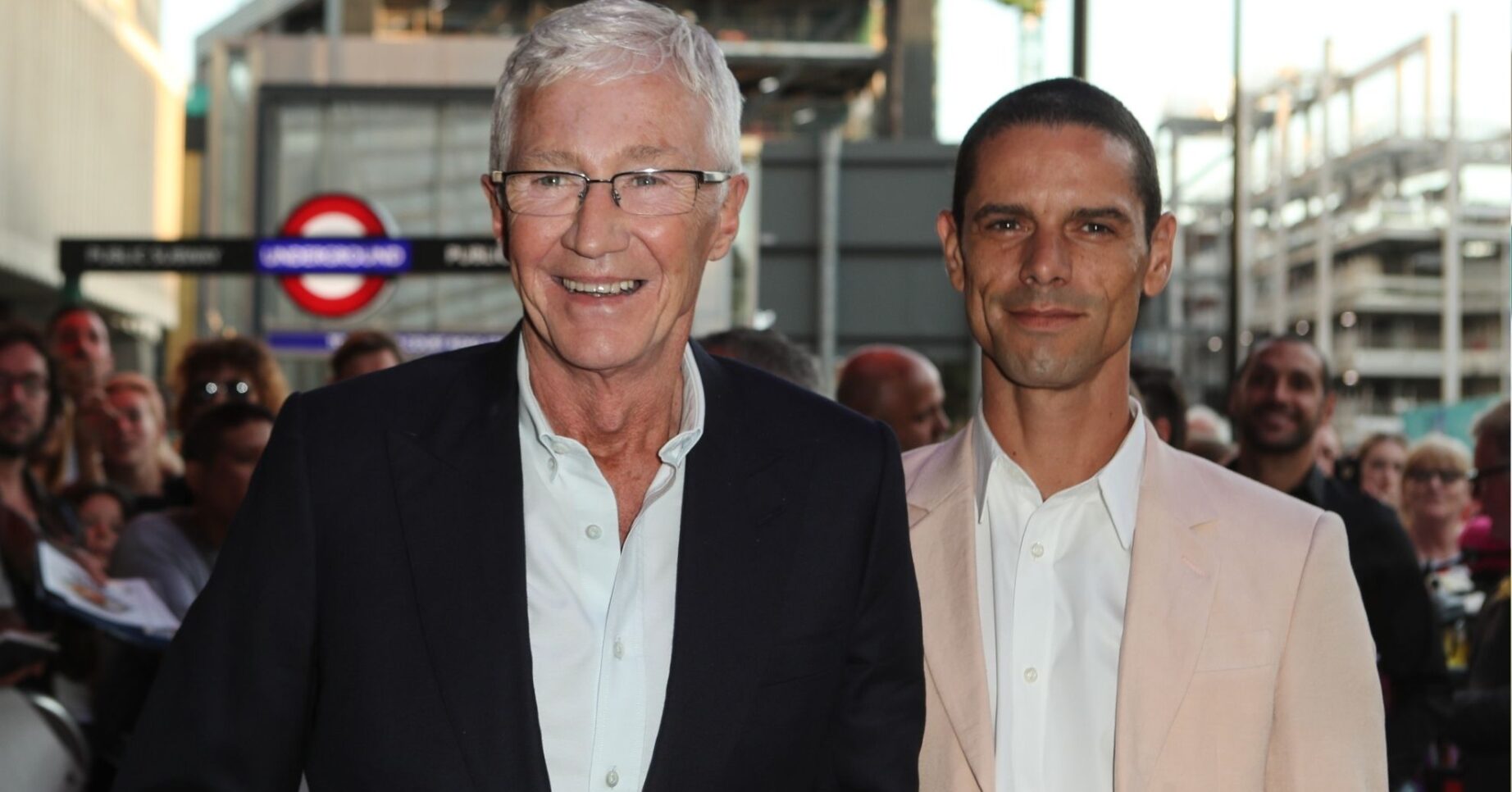 Paul O'Grady and husband Andre smiling