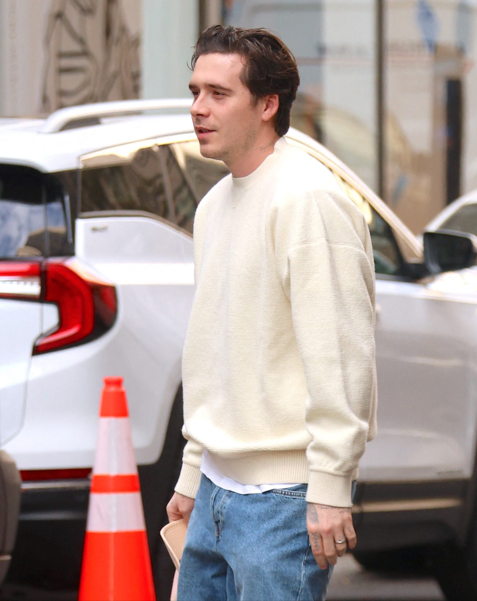 Brooklyn Beckham out walking on the street