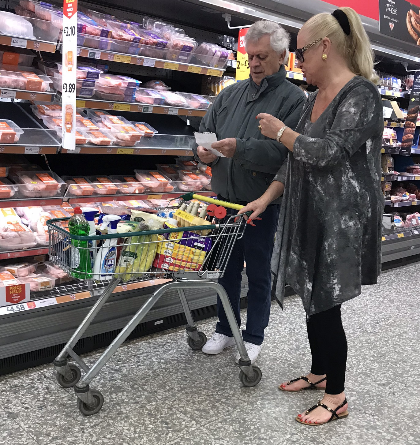 Kim Woodburn and husband shopping