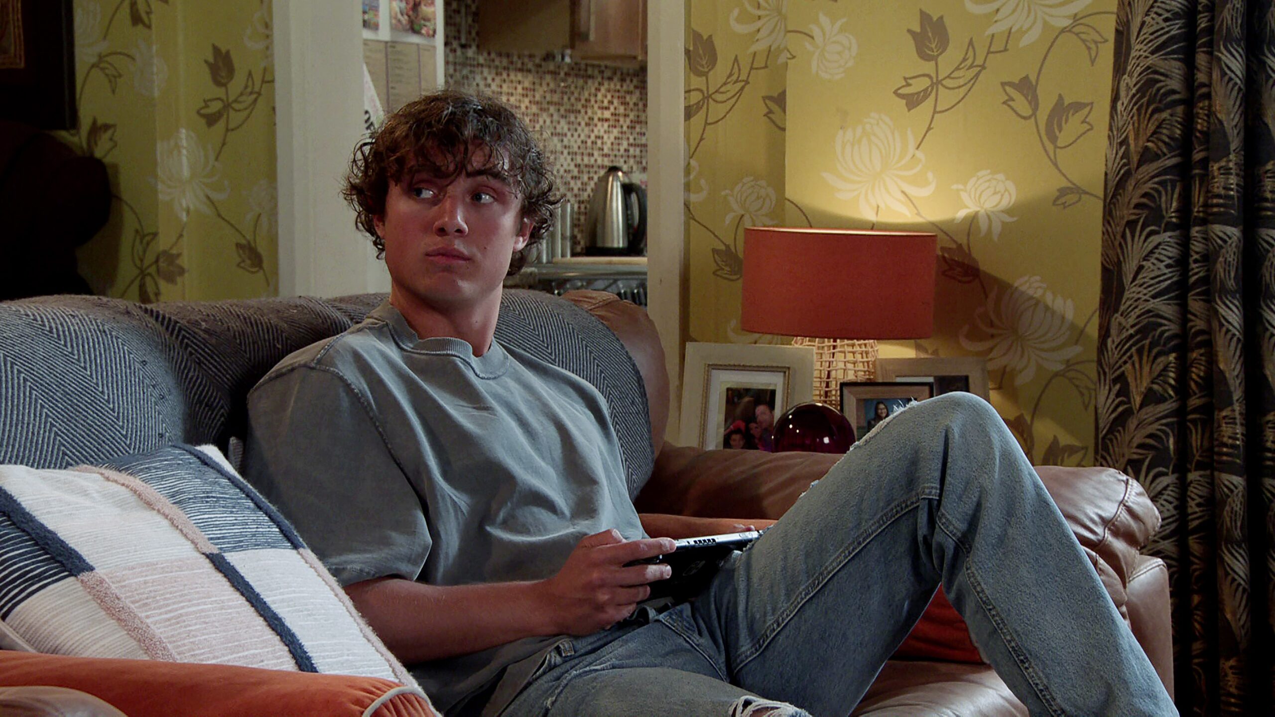 Brody on sofa in Coronation Street