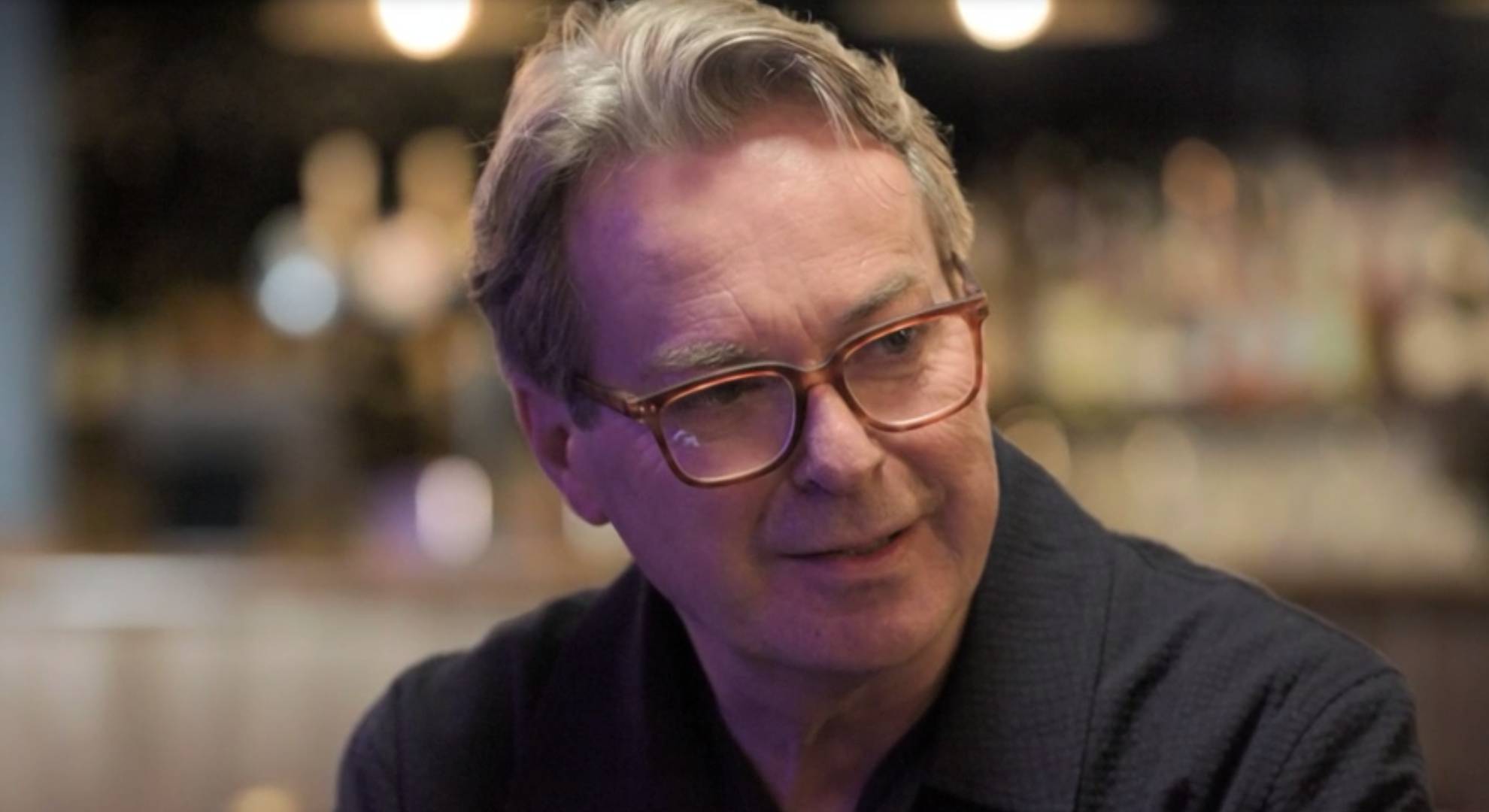 Julian Clary looks to his side