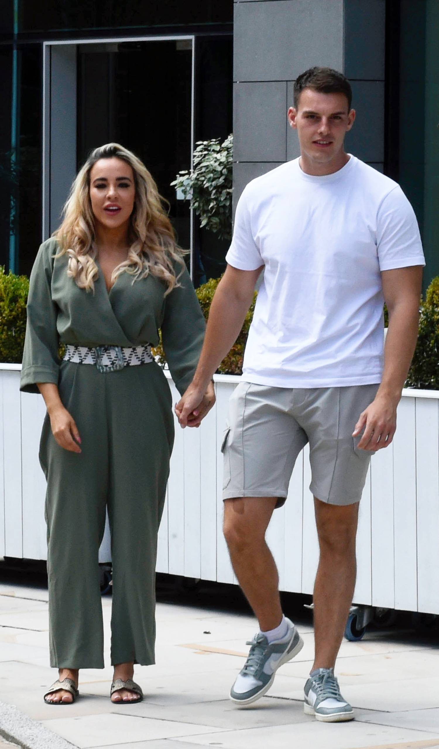 Stephanie Davis holding hands with former partner