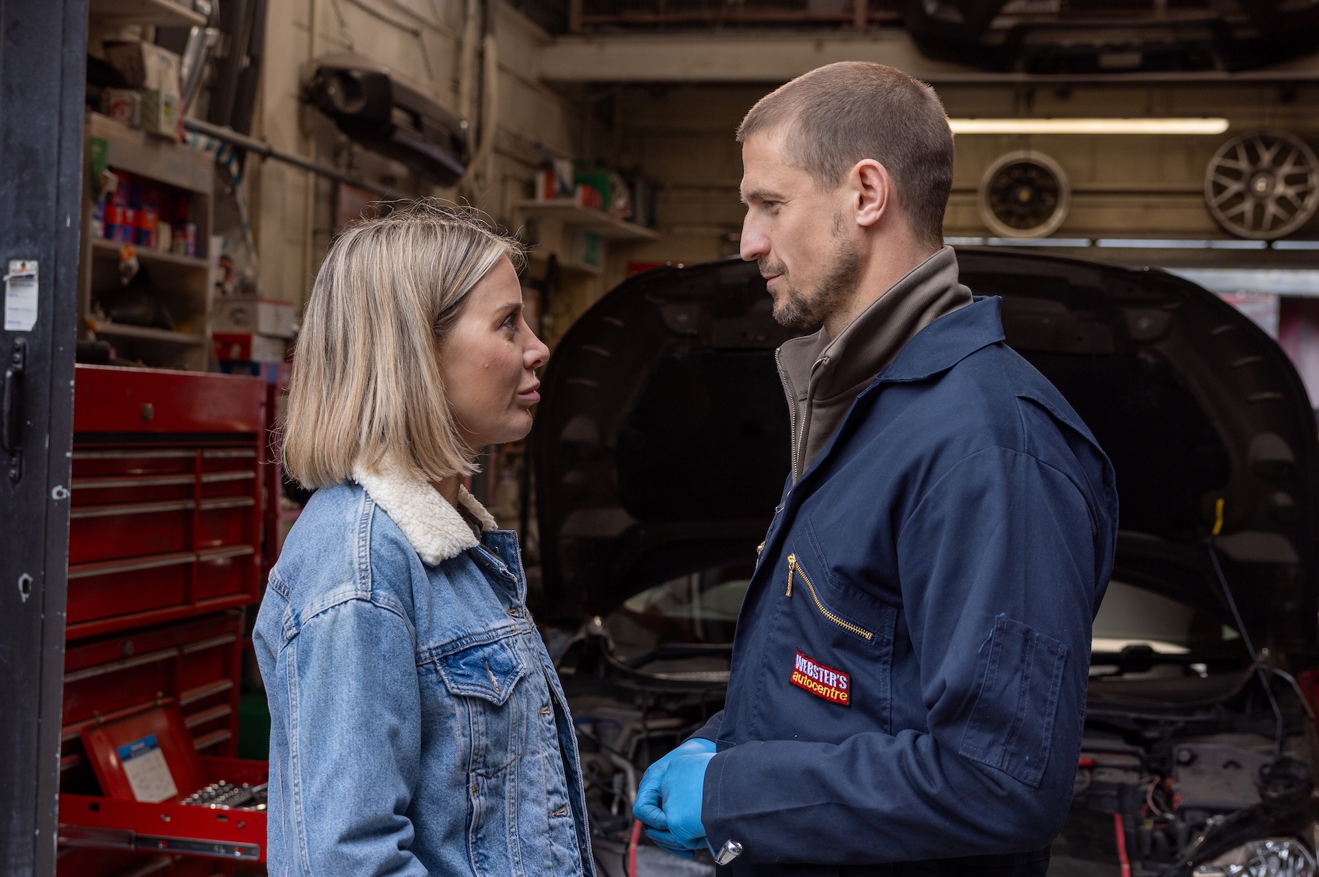 Coronation Street's Abi and Carl talking at the garage